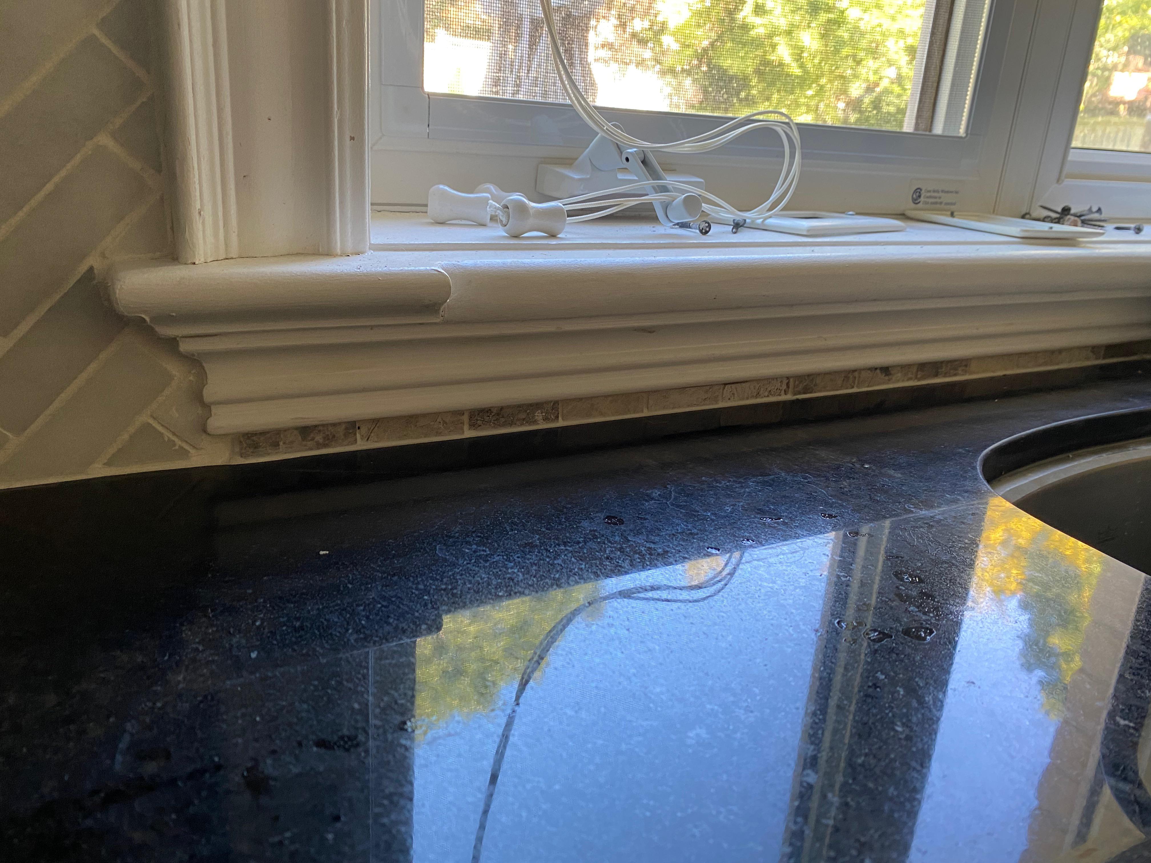 What to do with backsplash under window sill that is less than 1 inch