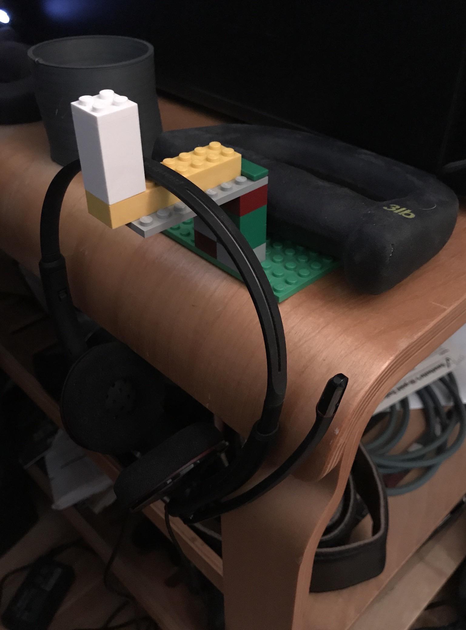 My 10 yr old son's answer to my headset always falling off that weight