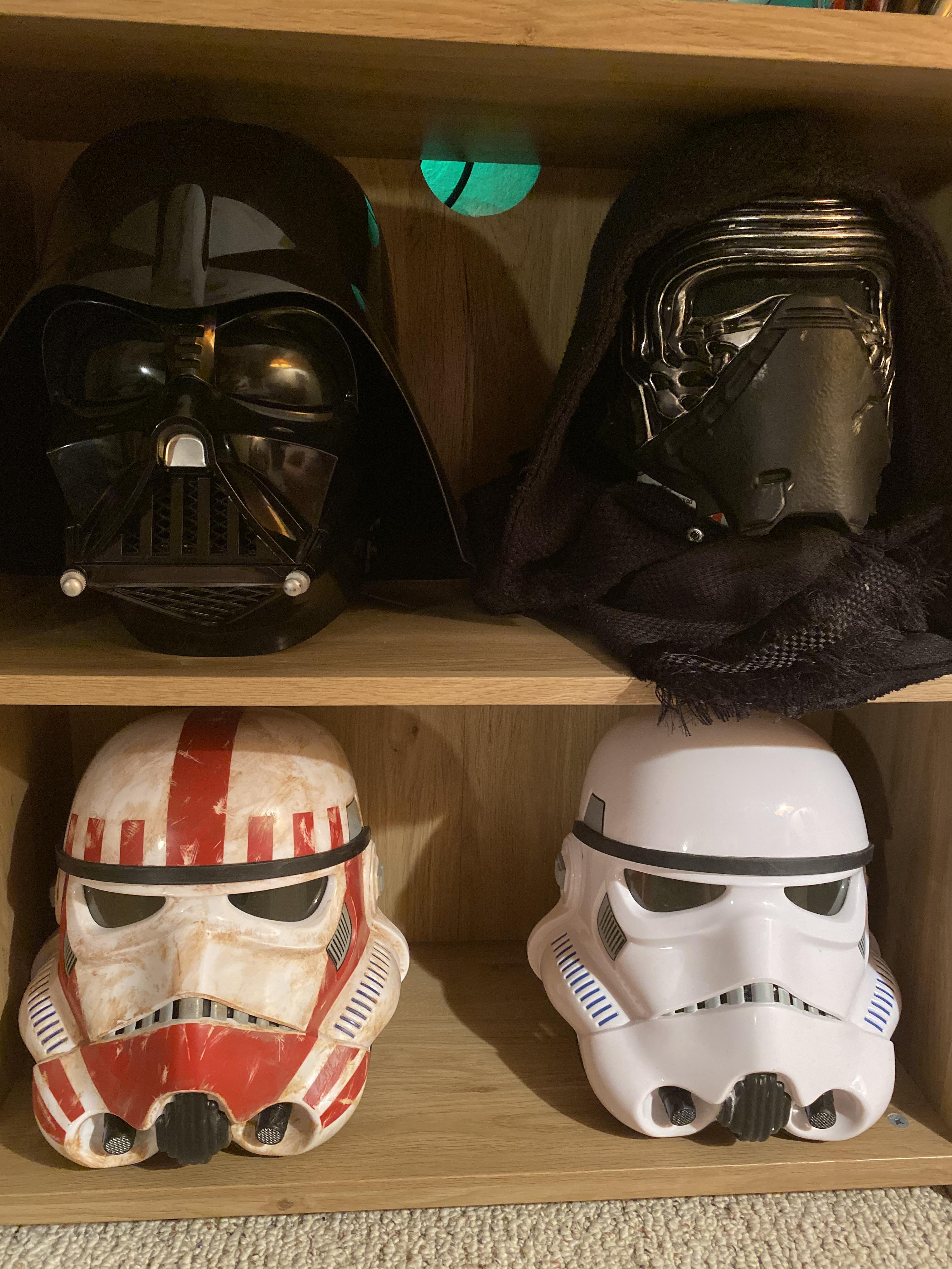 Just a few of the black series helmets I have on display in my bookcase