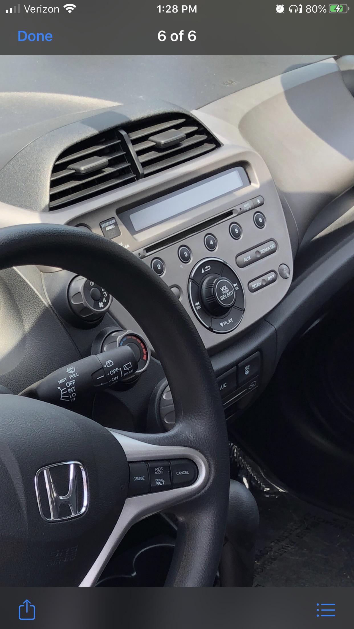 Does this 2013 Honda Fit have a plug in so I can play my music on the