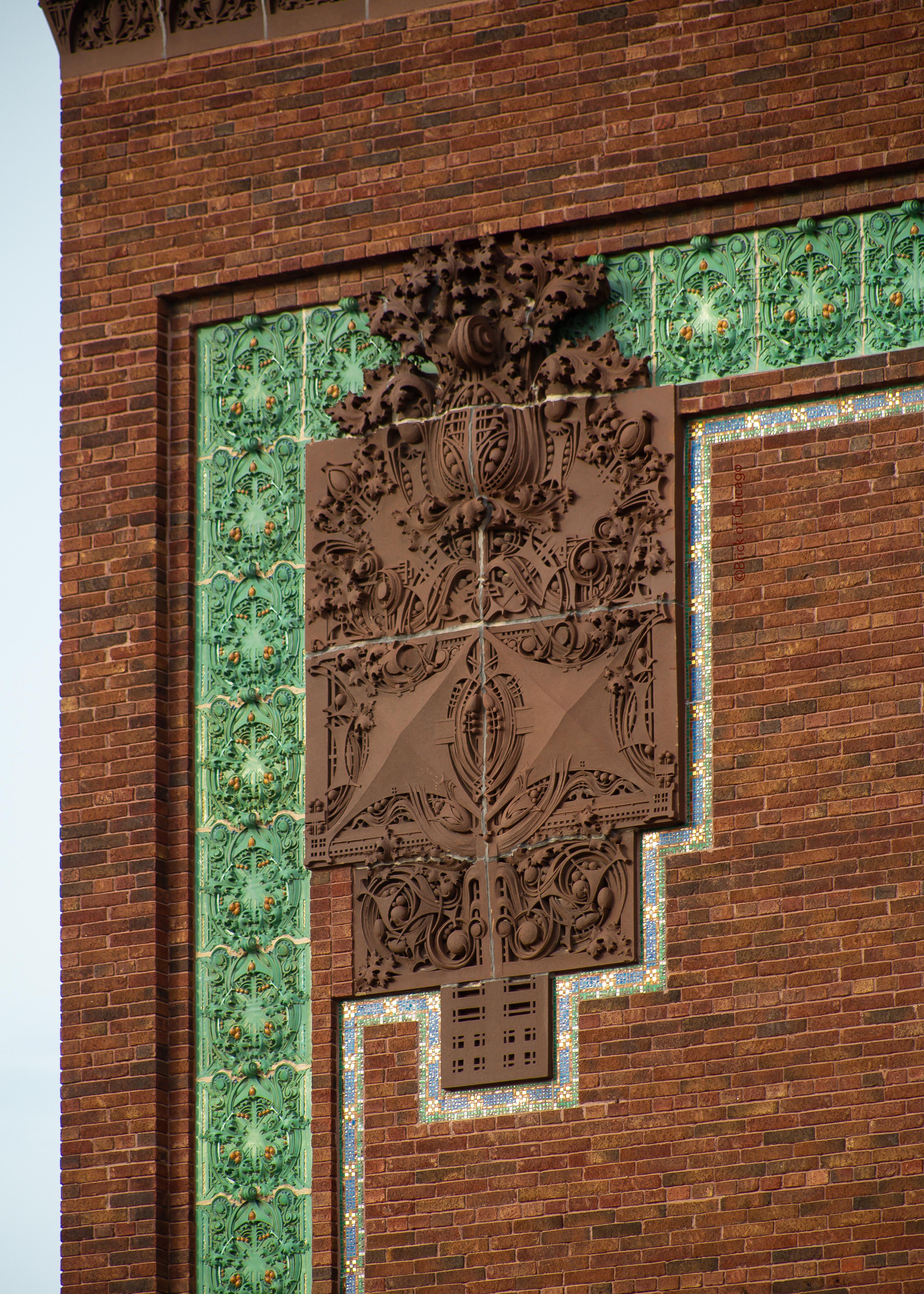 [building] Terracotta cartouche on Louis Sullivan's National Farmer's