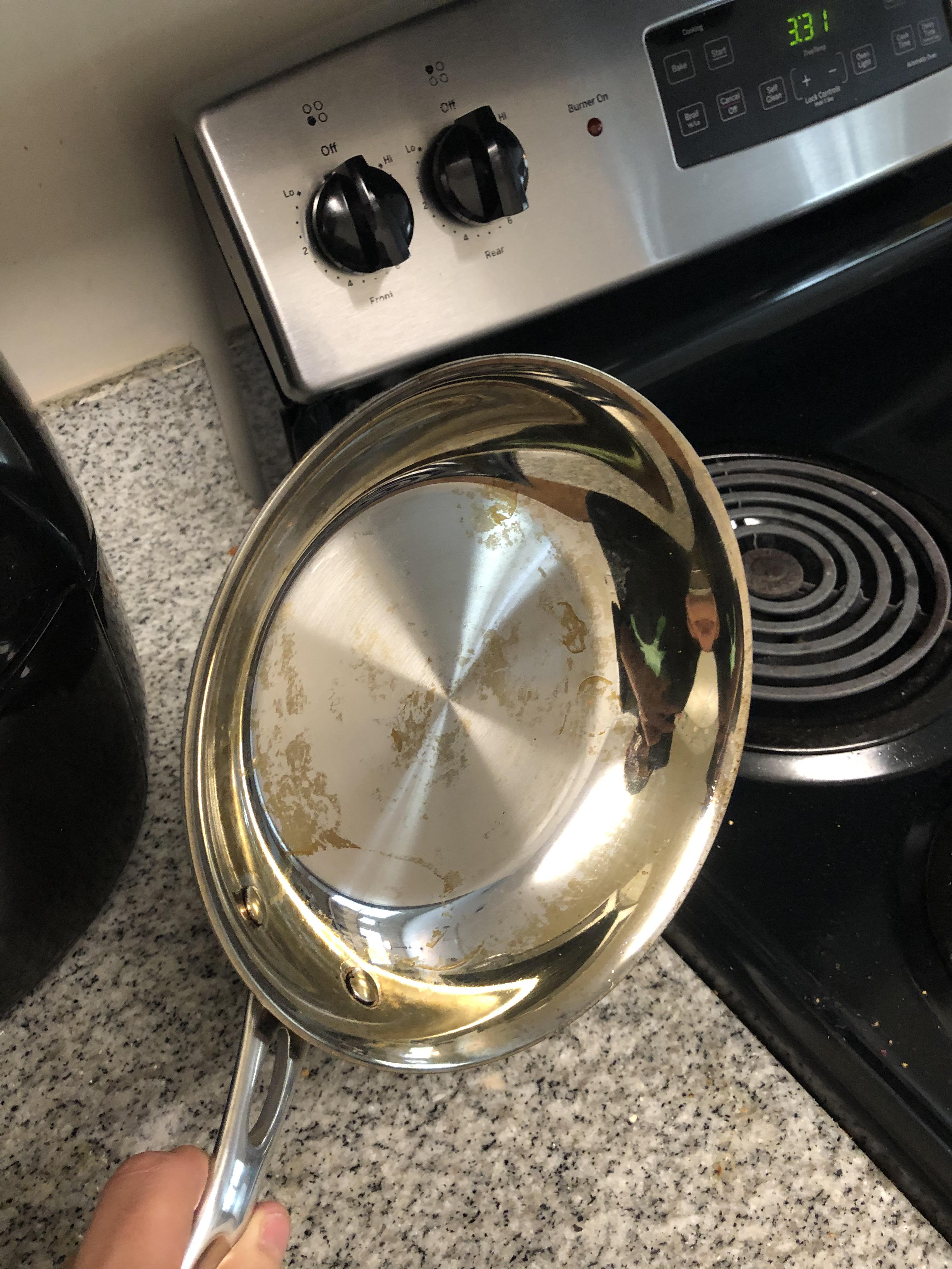 Any advice on how to treat my stainless steel pan and remove those