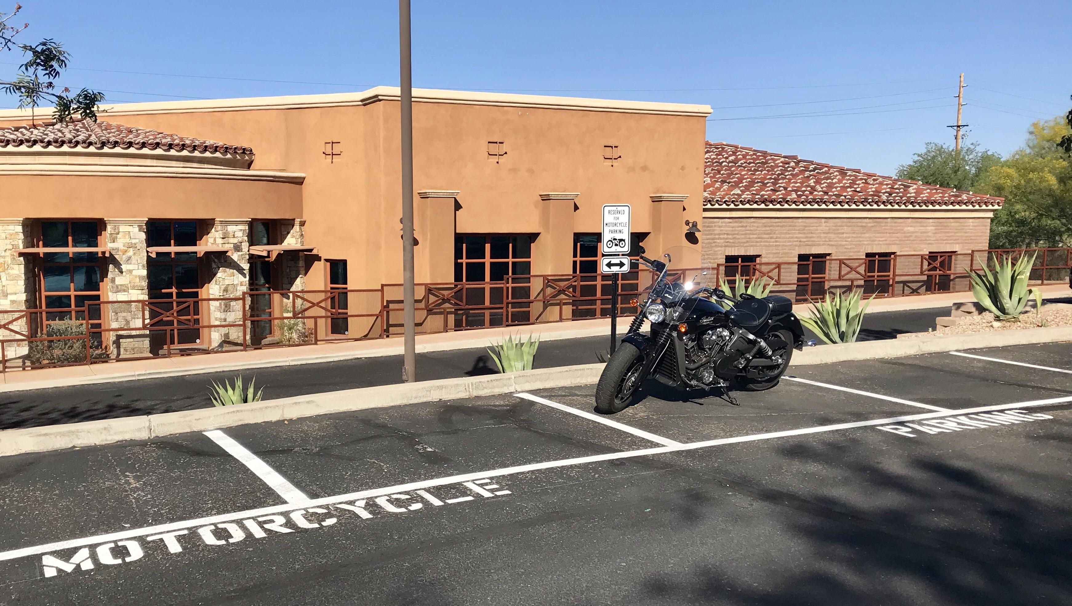 I got motorcycle parking added to my office complex. r/motorcycles