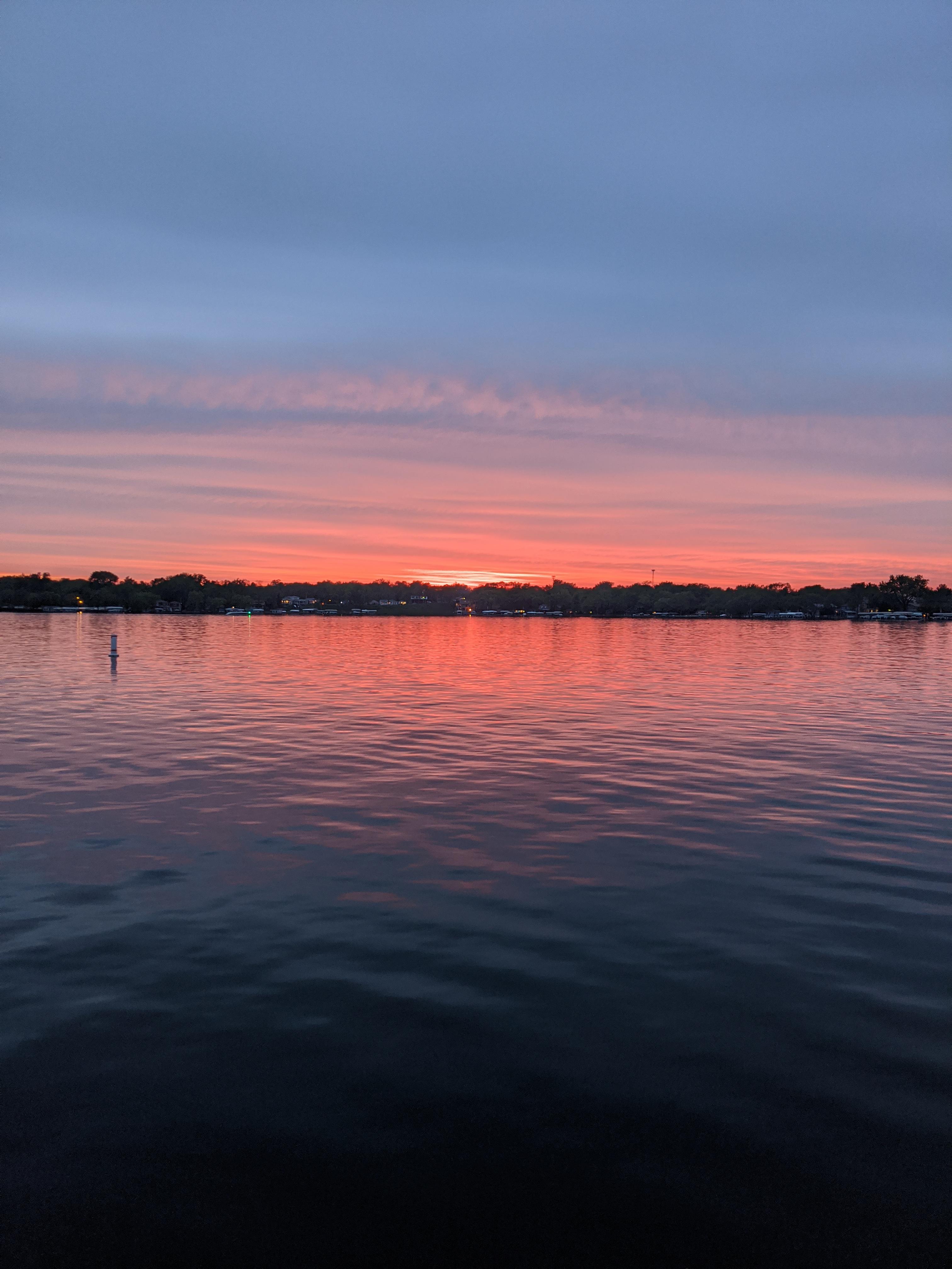 Sunset last night over West Lake Okoboji r/Iowa