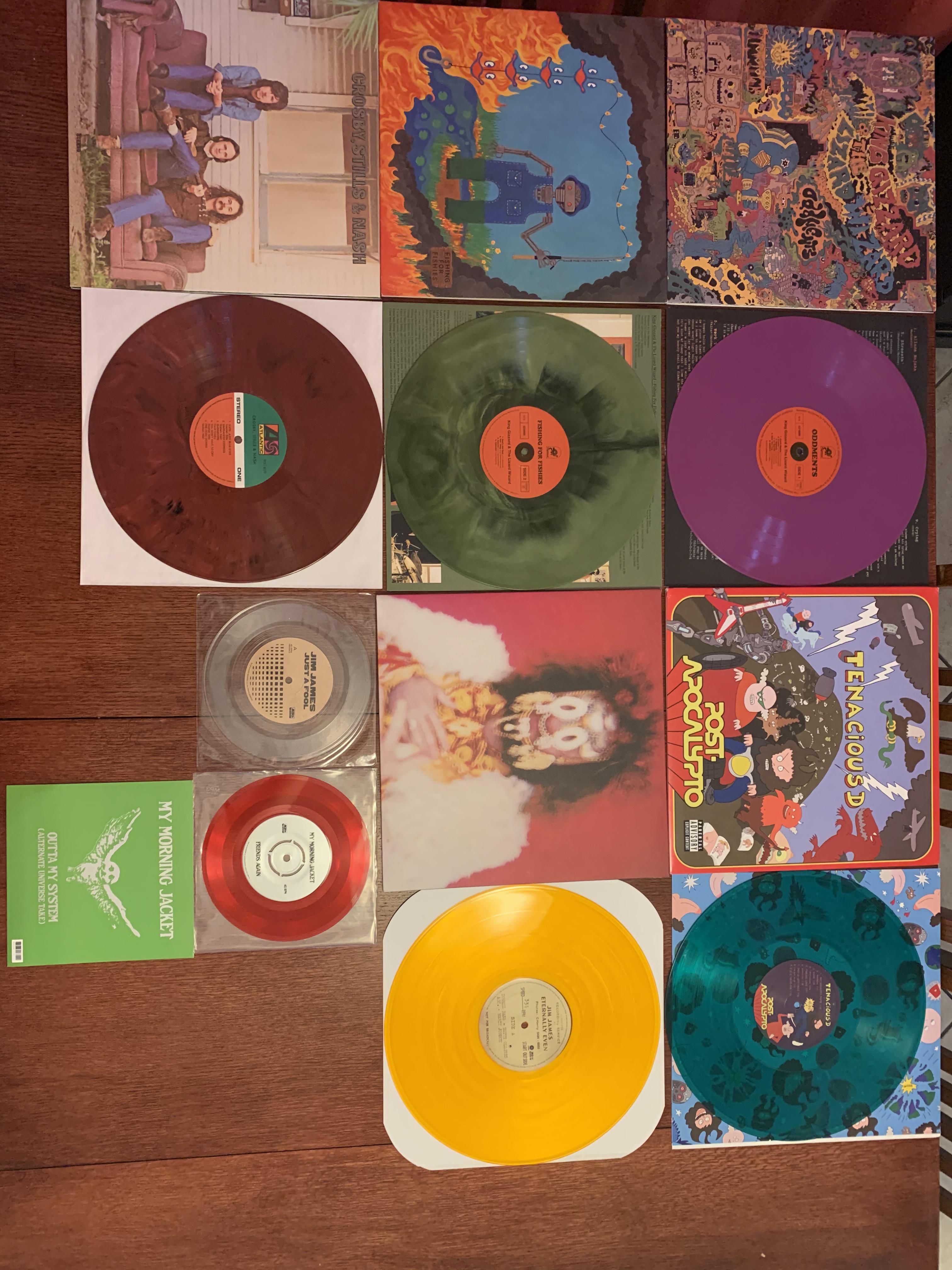 My colored vinyl collection so far! Albums in comments r/vinyl