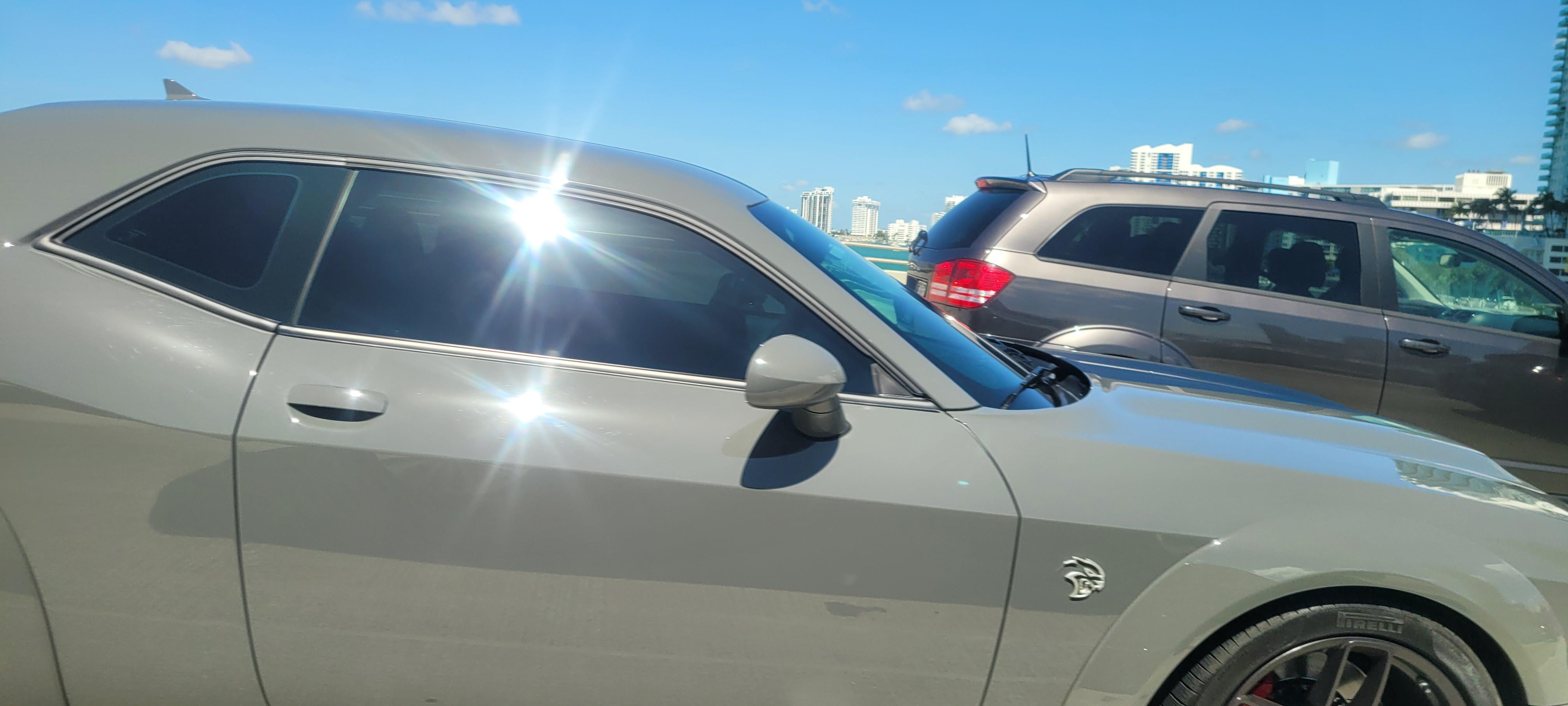 This hellcat I saw on the way to the beach in Miami r/hellcat