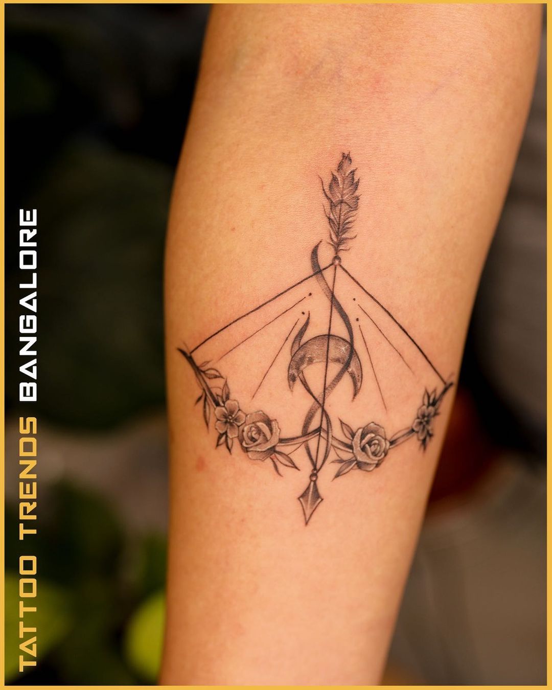 Bow And Arrow Tattoo On Ribs