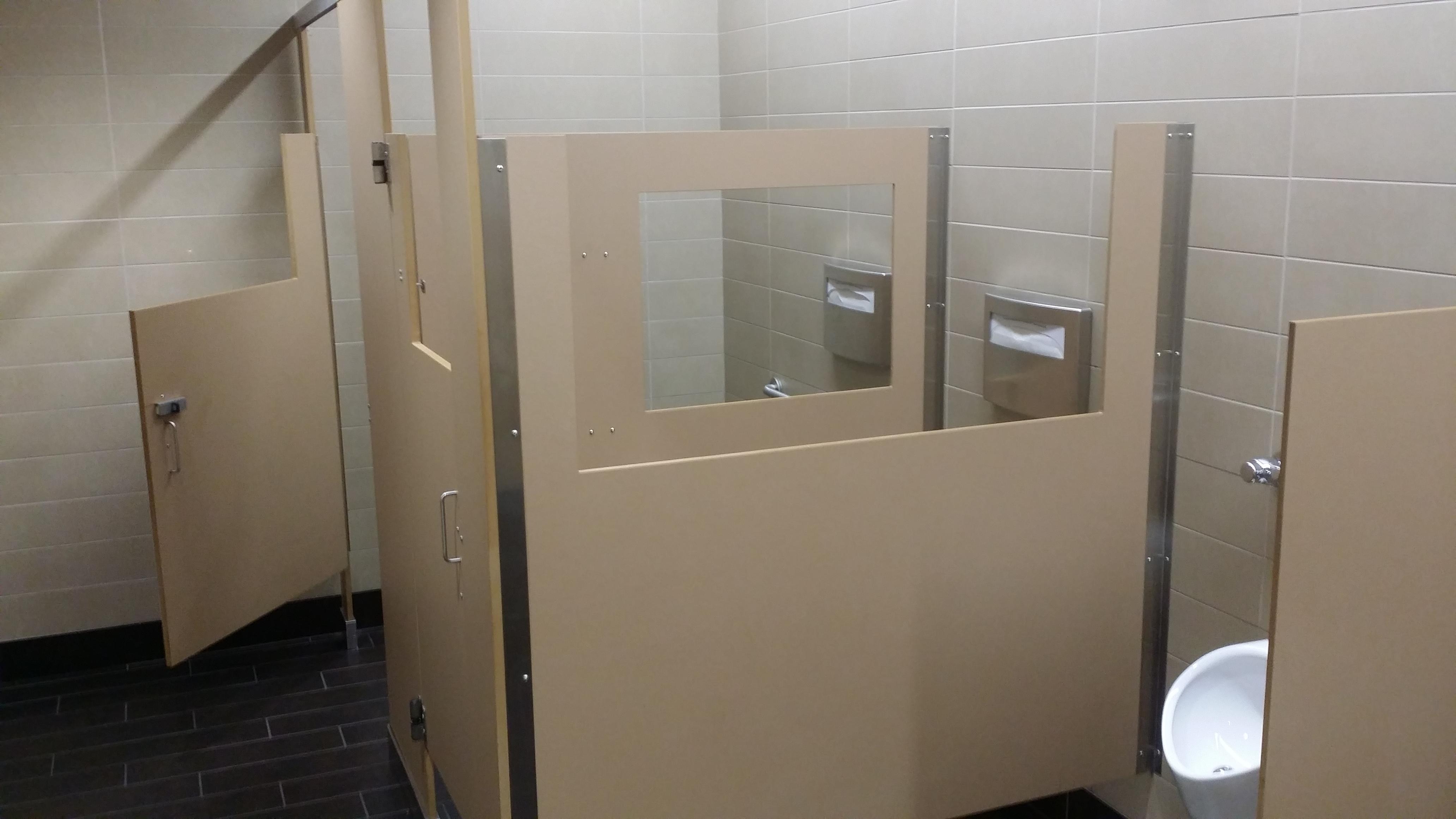 I'll see your urinal divider and raise you toilet stall windows. (No