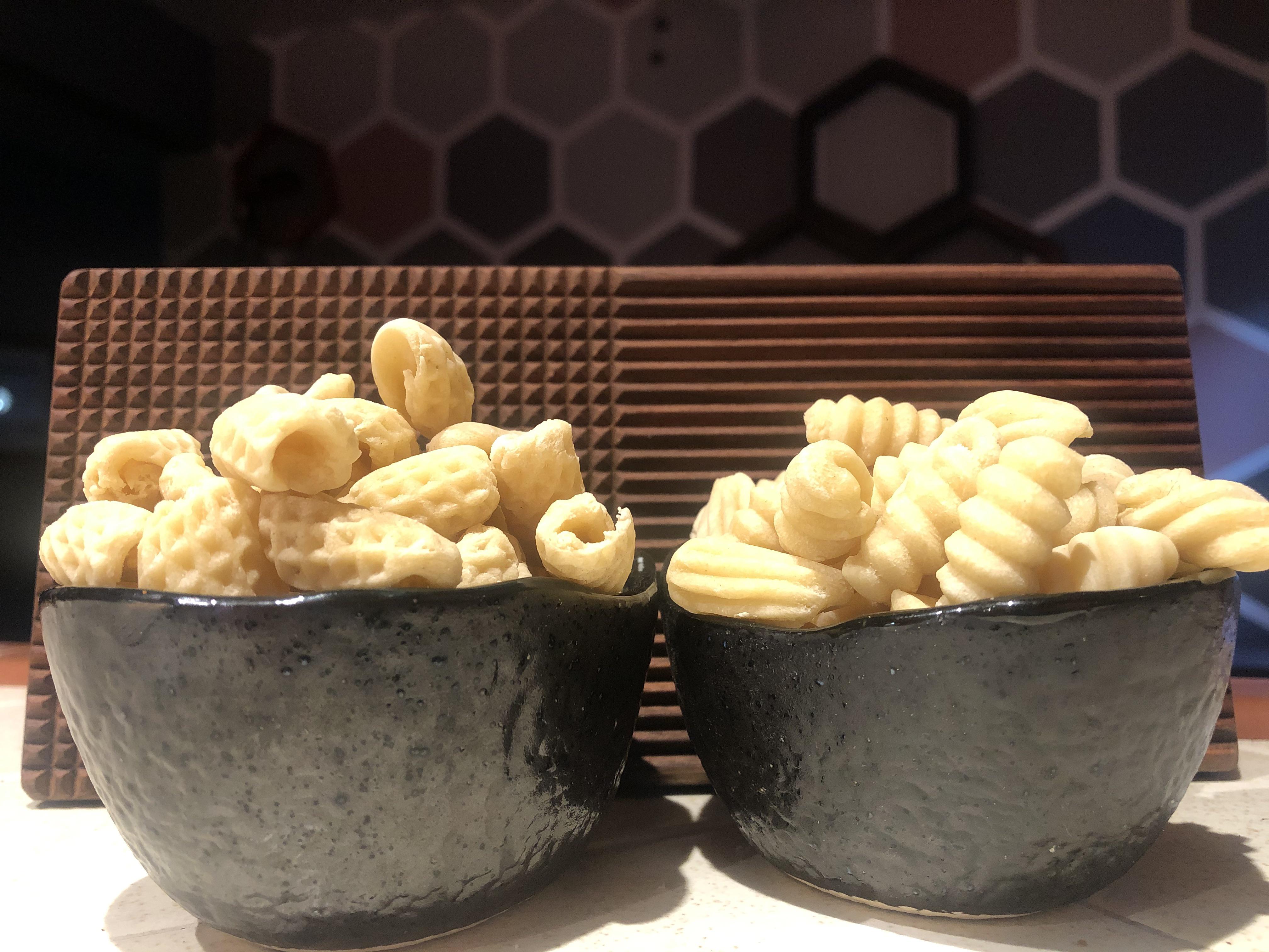 First time making pasta shapes with semolina flour and pasta board. r