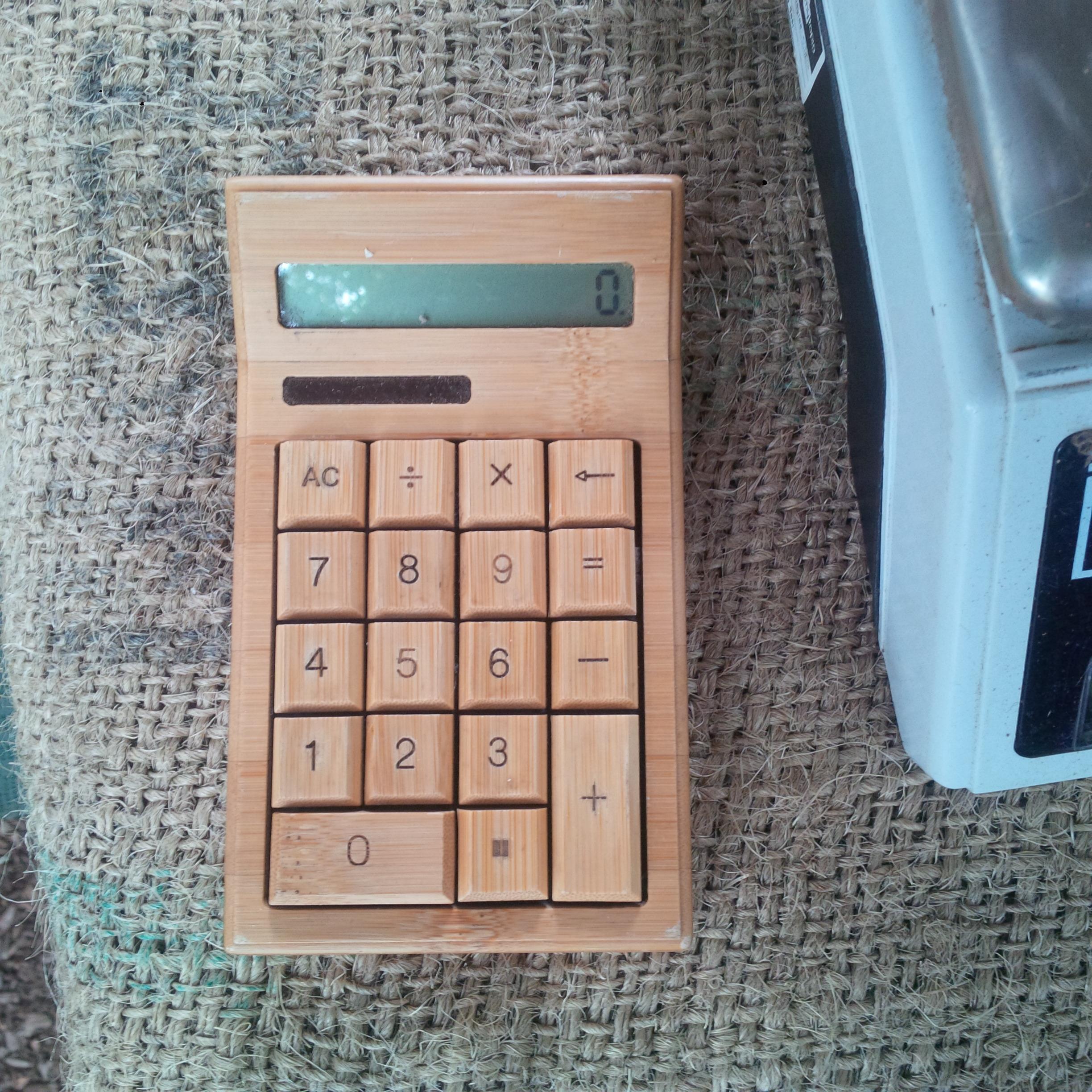 A wooden calculator. r/mildlyinteresting