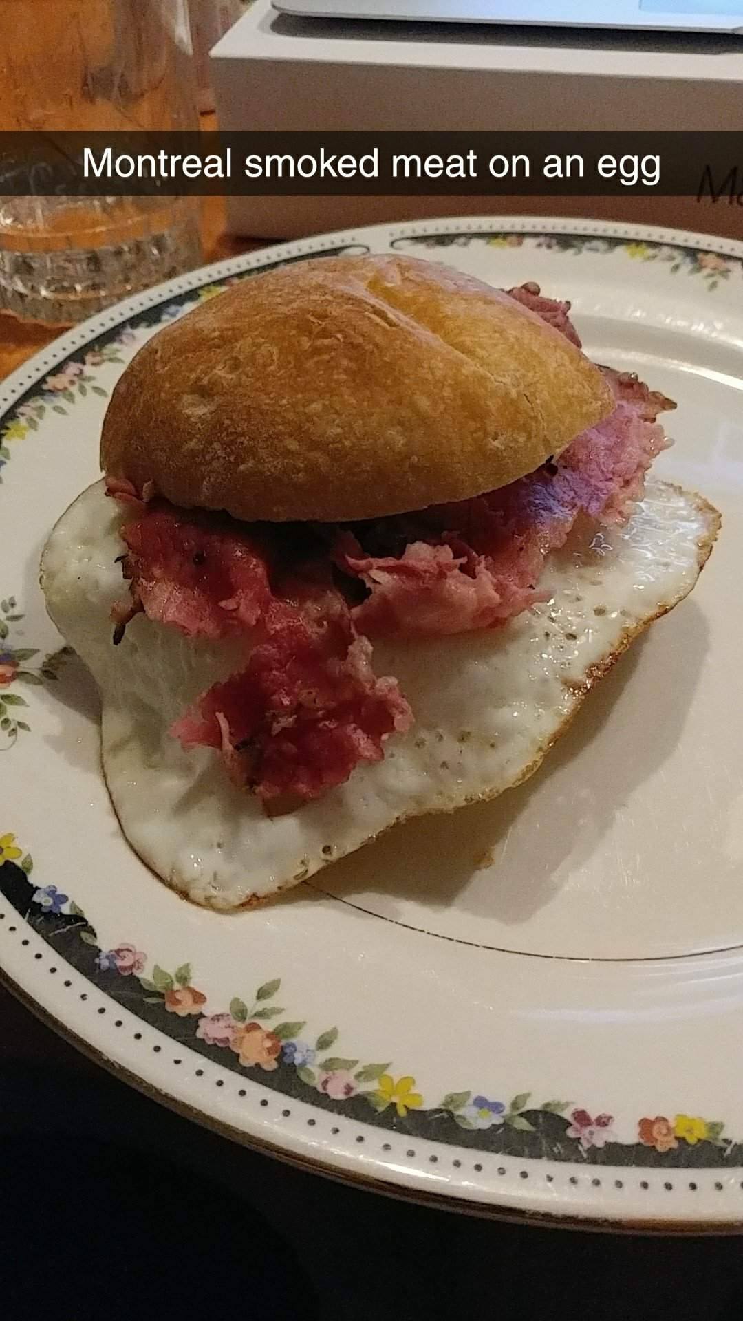 Egg on Montreal smoked meat in a bun. Delish! r/PutAnEggOnIt