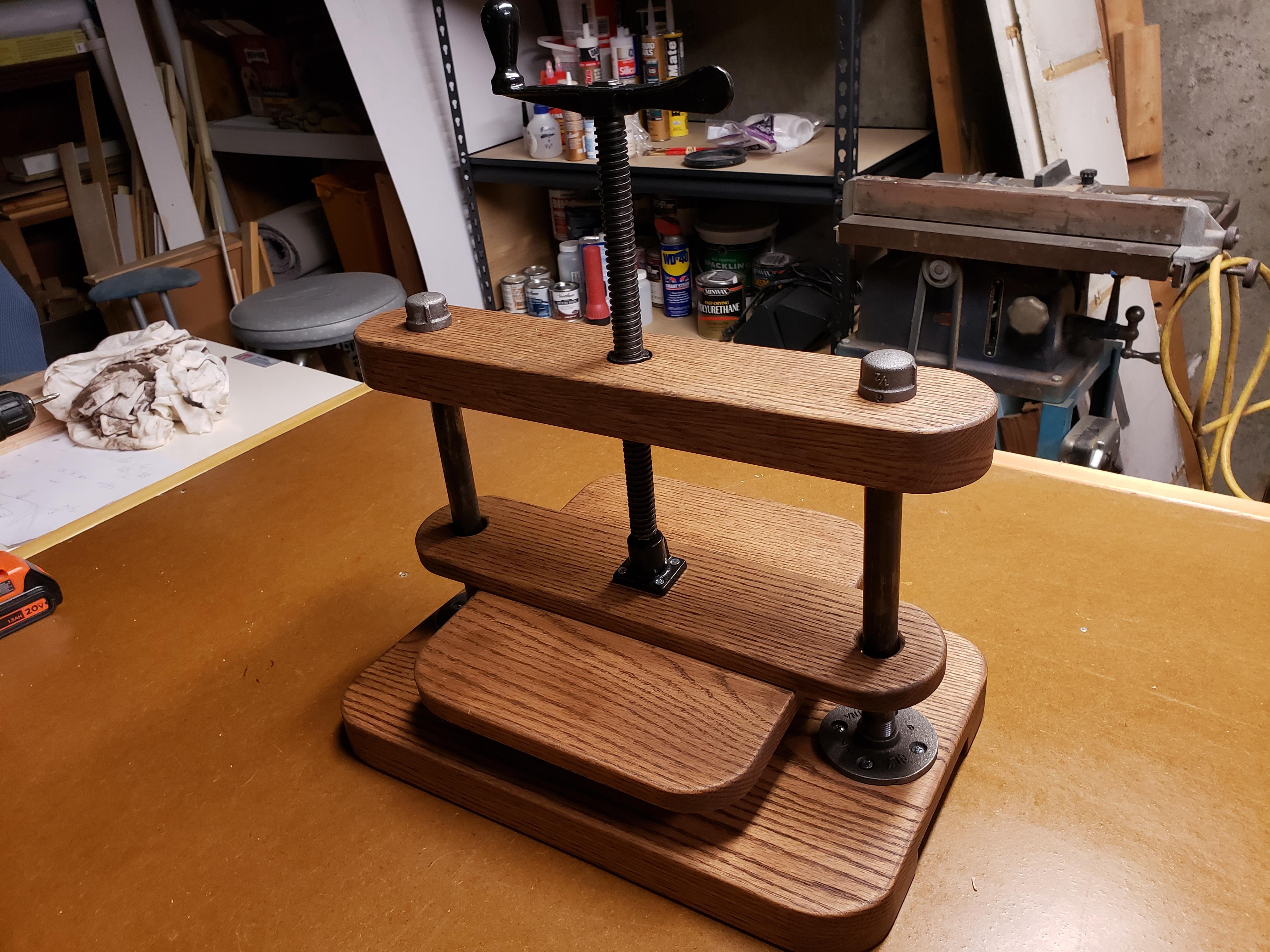Book binding press I made for my brother, it has a nice copper wire