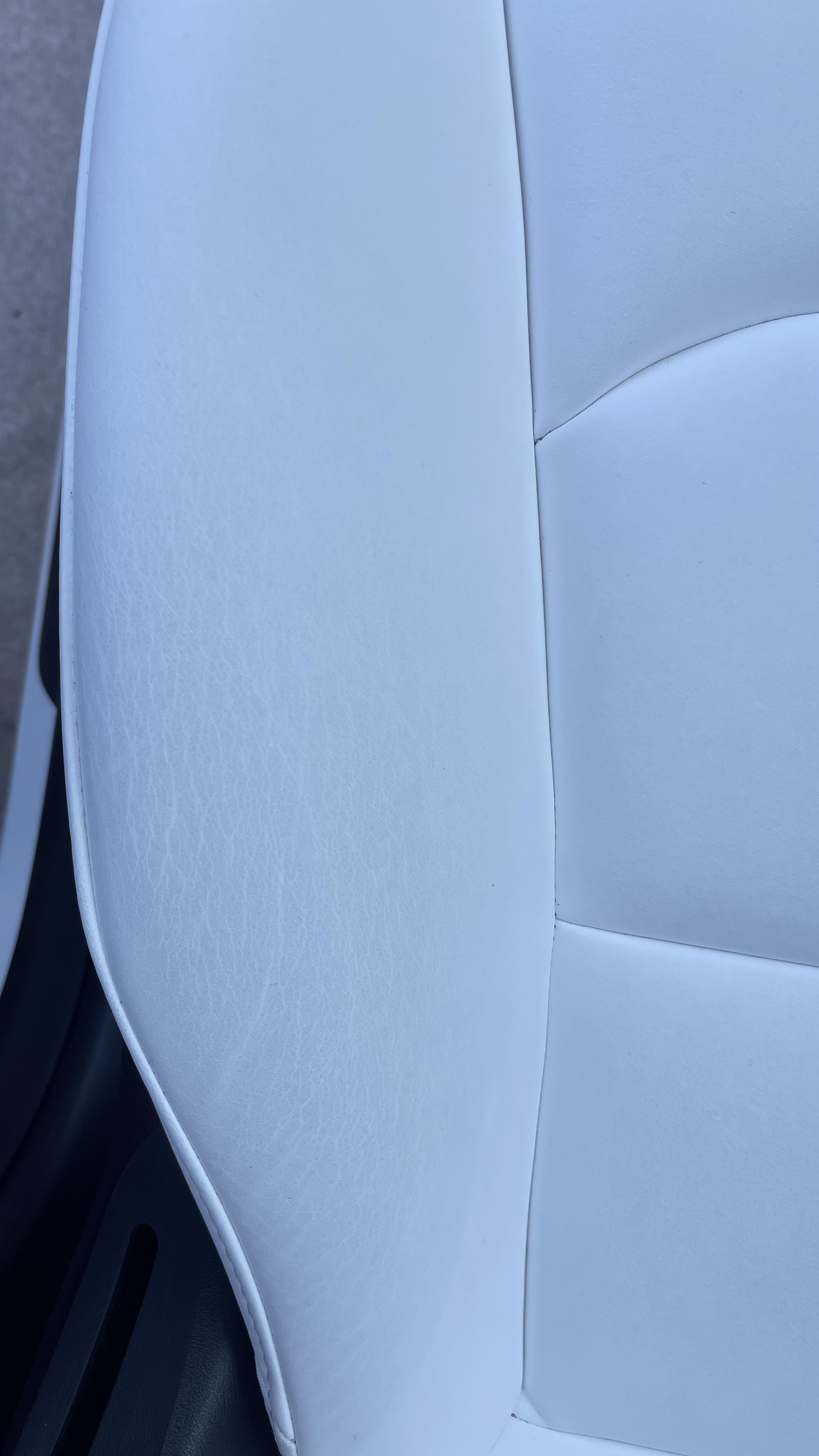 Seat stretch marks. Not even a month in and the seats have stretch