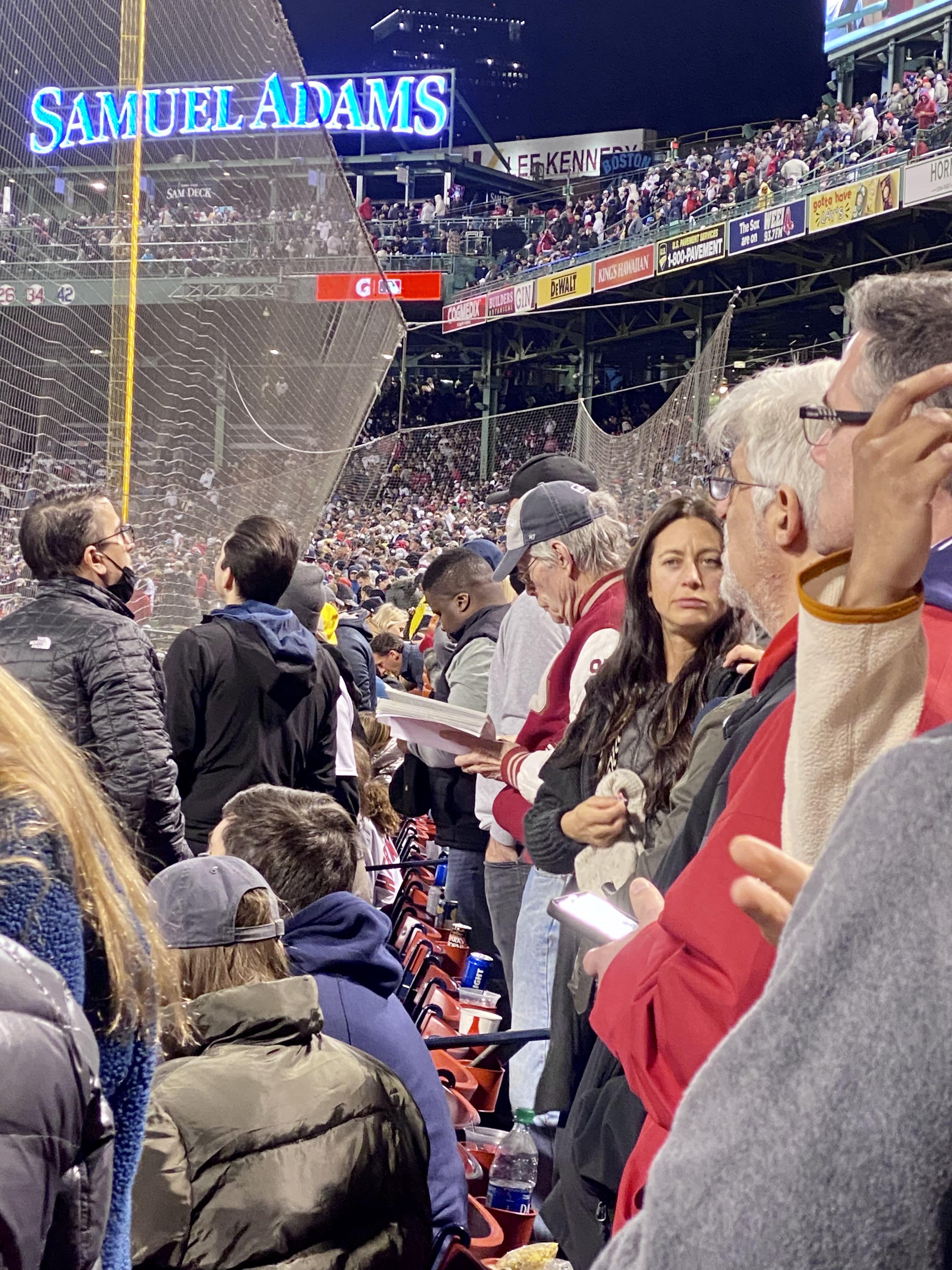 Stephen King reading a book at the Red Sox game r/mildlyinteresting