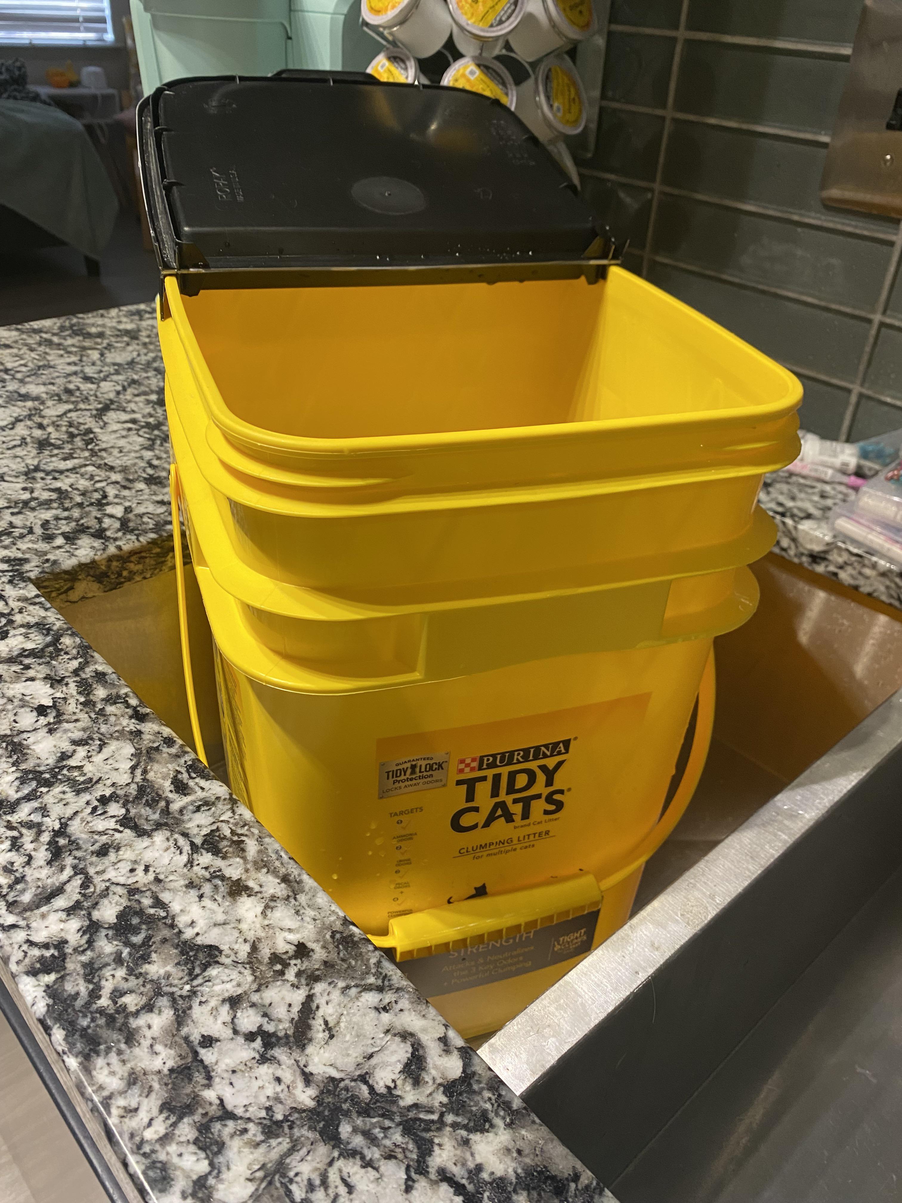 Can I use an empty litter pail for storing cat food if I rinse it out