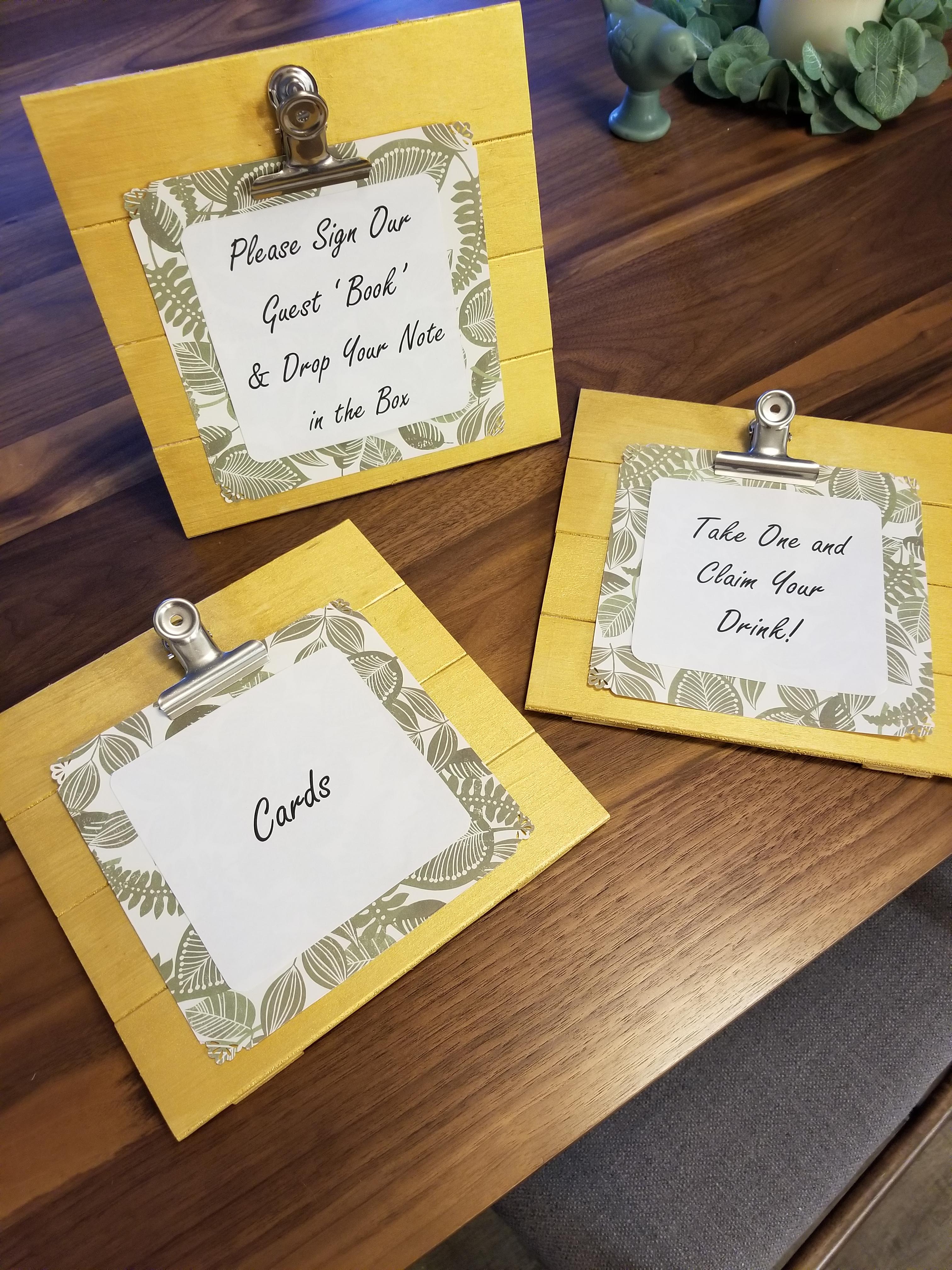 .99¢ boards from Michaels painted in gold with some scrapbook paper