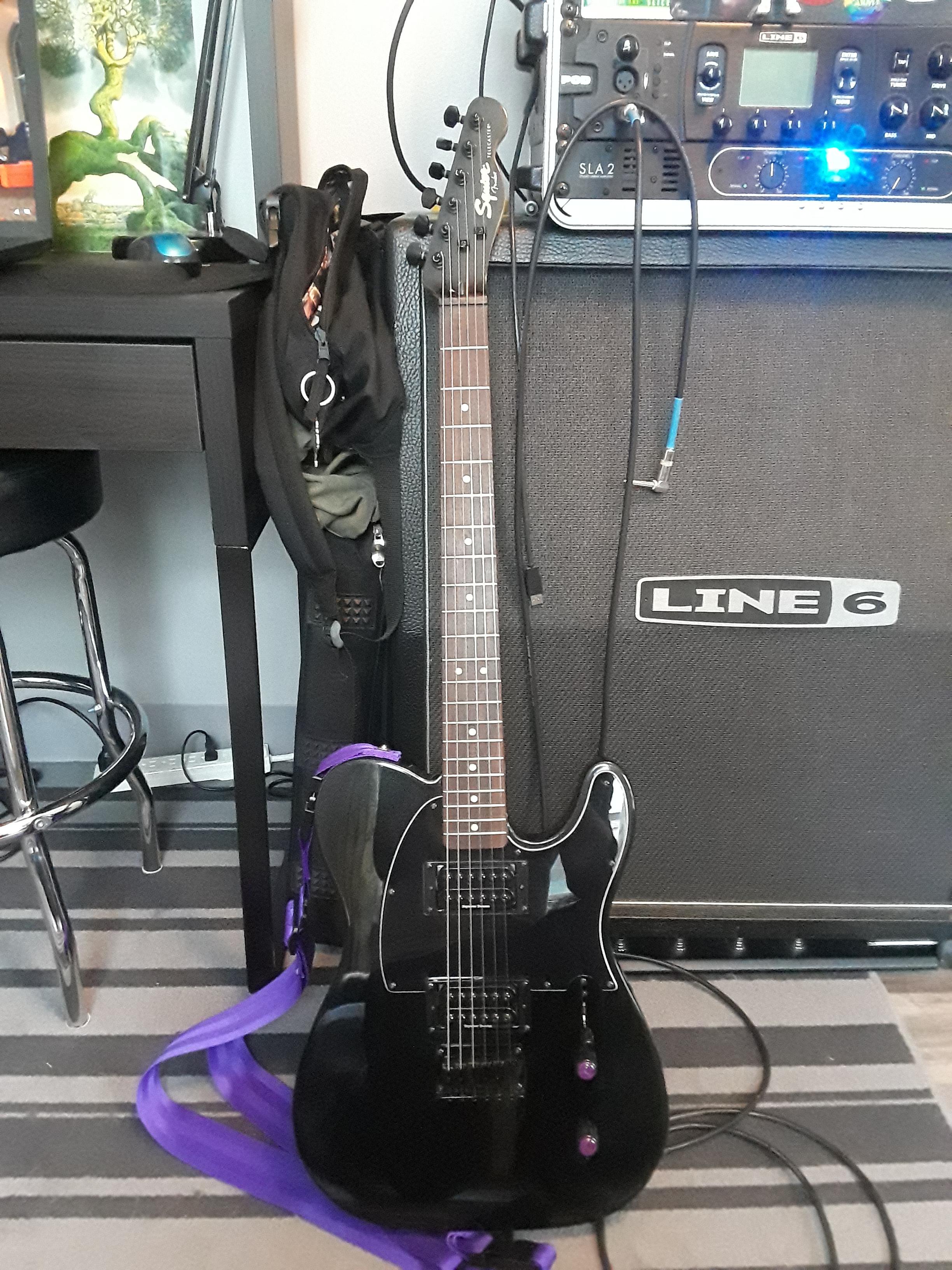 Seymour Duncan Invaders are installed and the neck is sanded for a