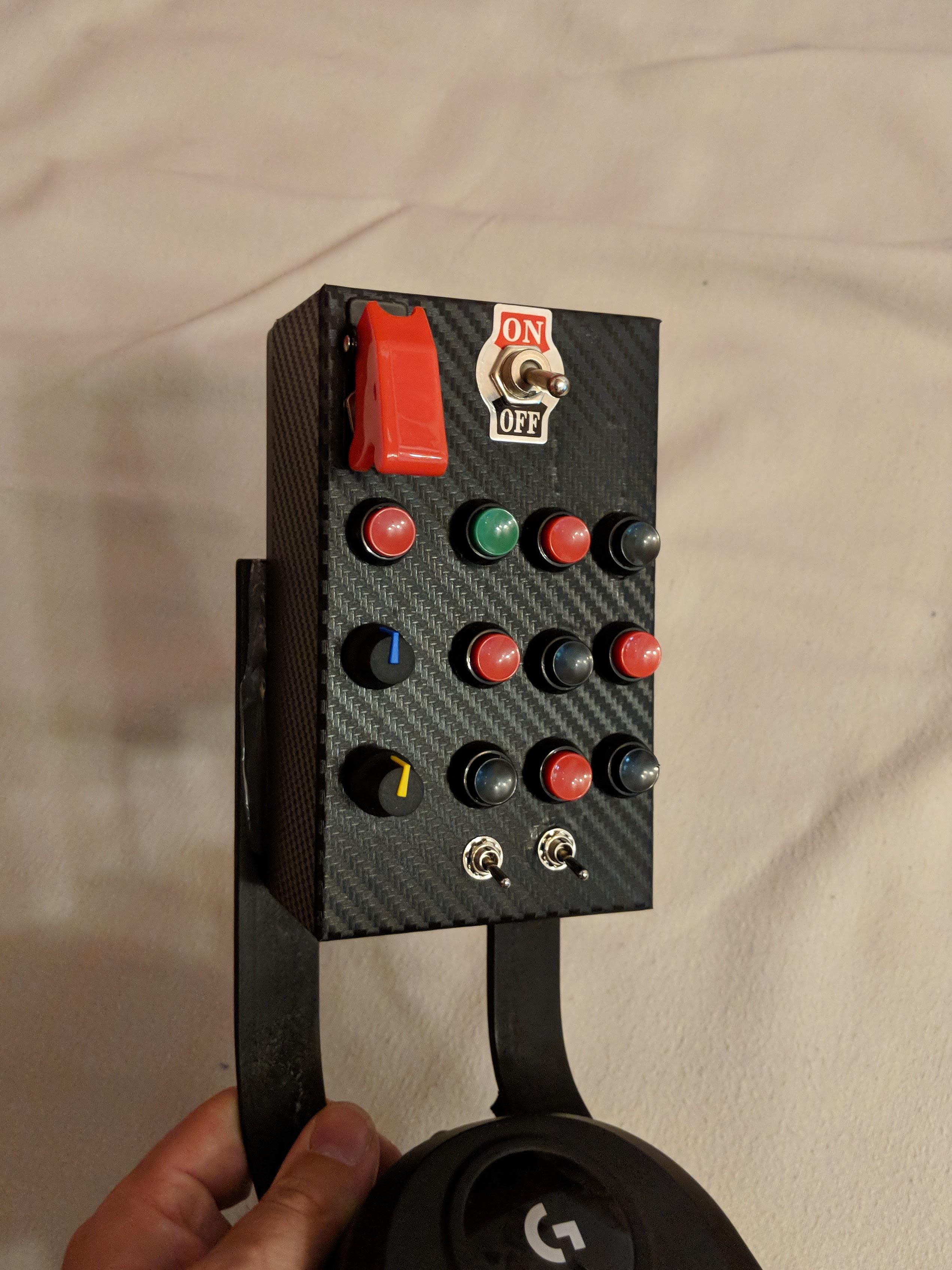 A button box for Simracing I built from scratch. It uses the Arcaze USB