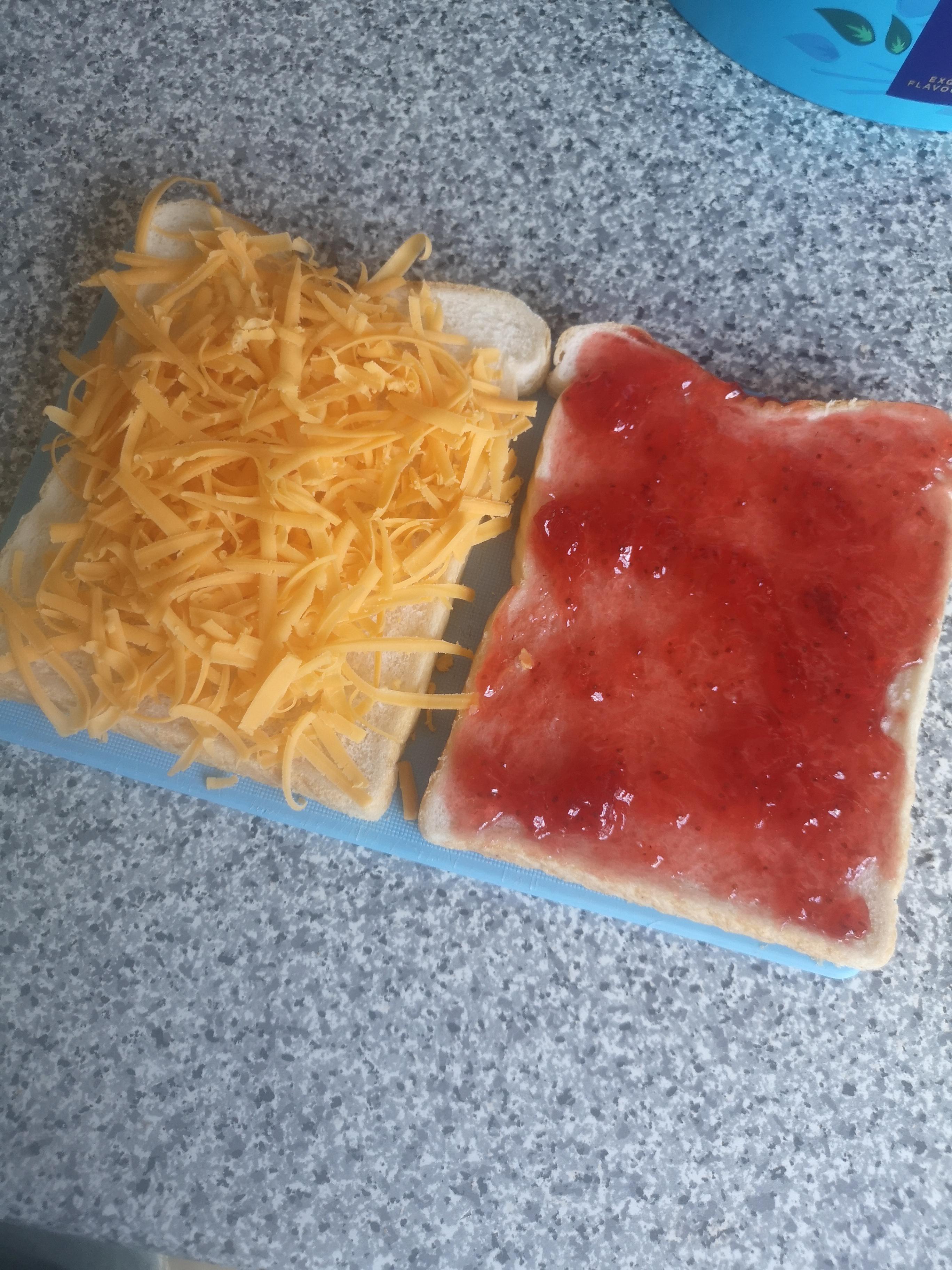 Cheddar cheese and strawberry jam sandwich. Don't knock it till you've