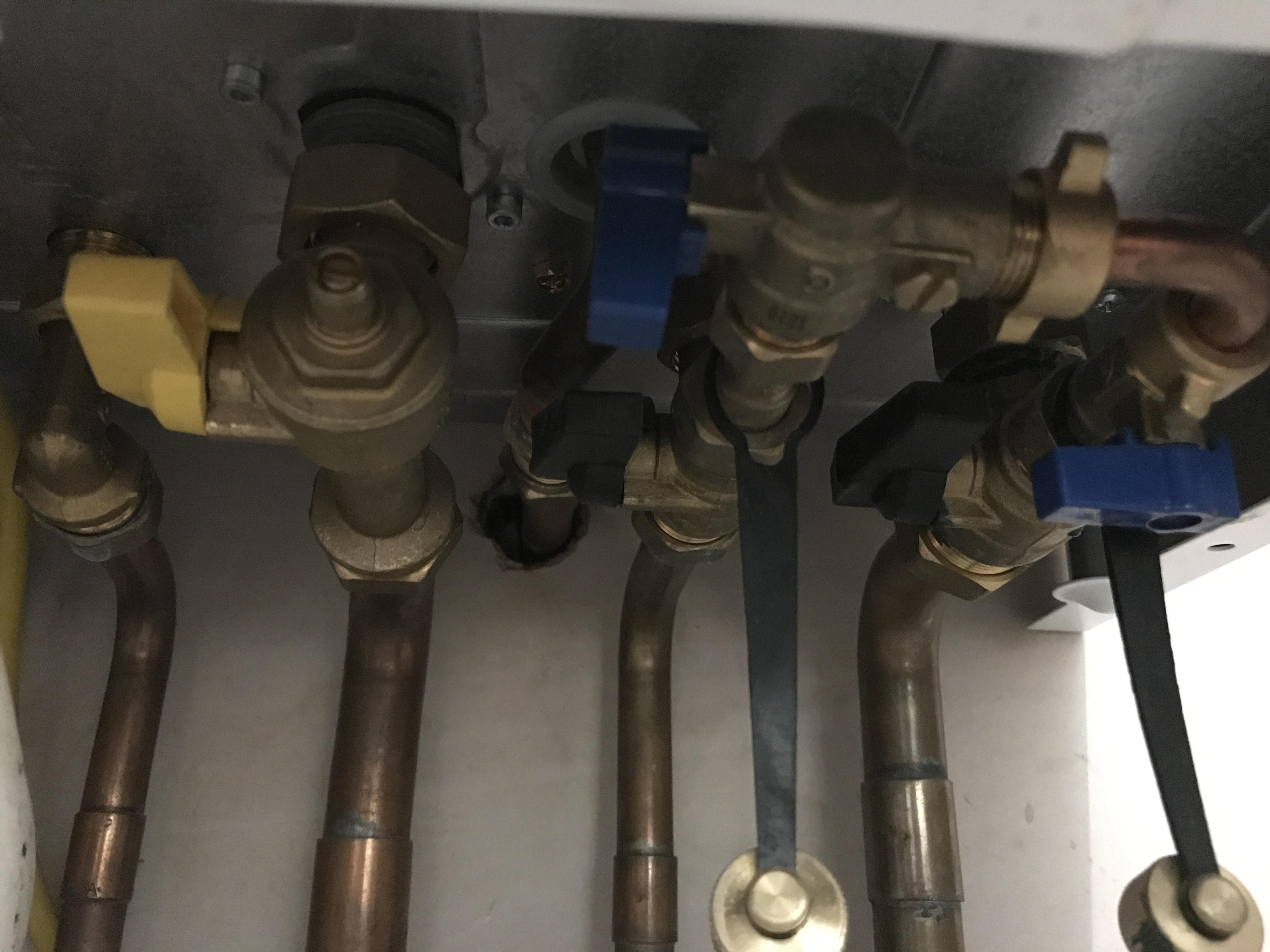 Looking for help after installing a radiator. I think the boiler is