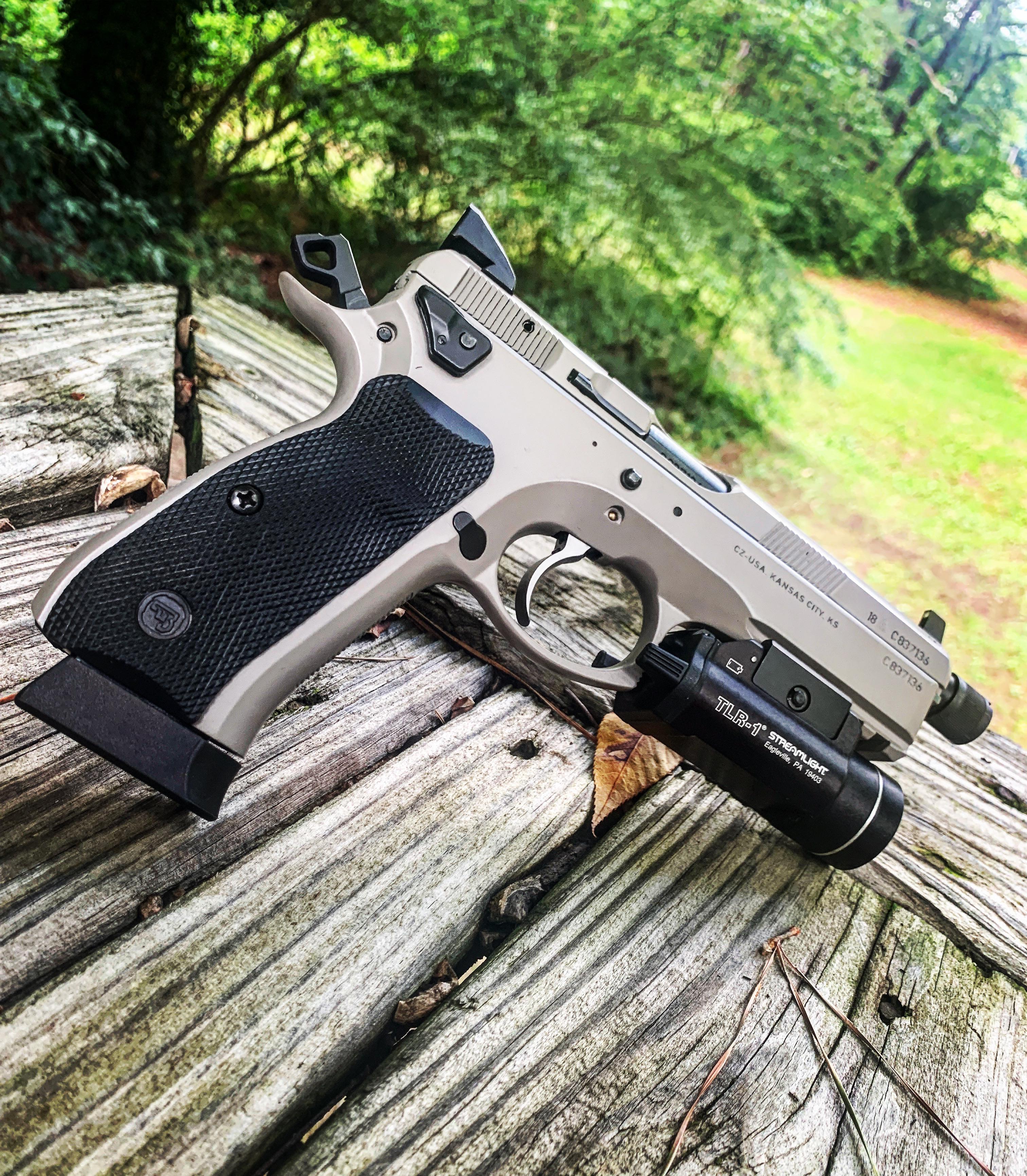 Here’s my CZ 75 SP01 Tactical with the Cajun Gun Works Pro kit r/guns