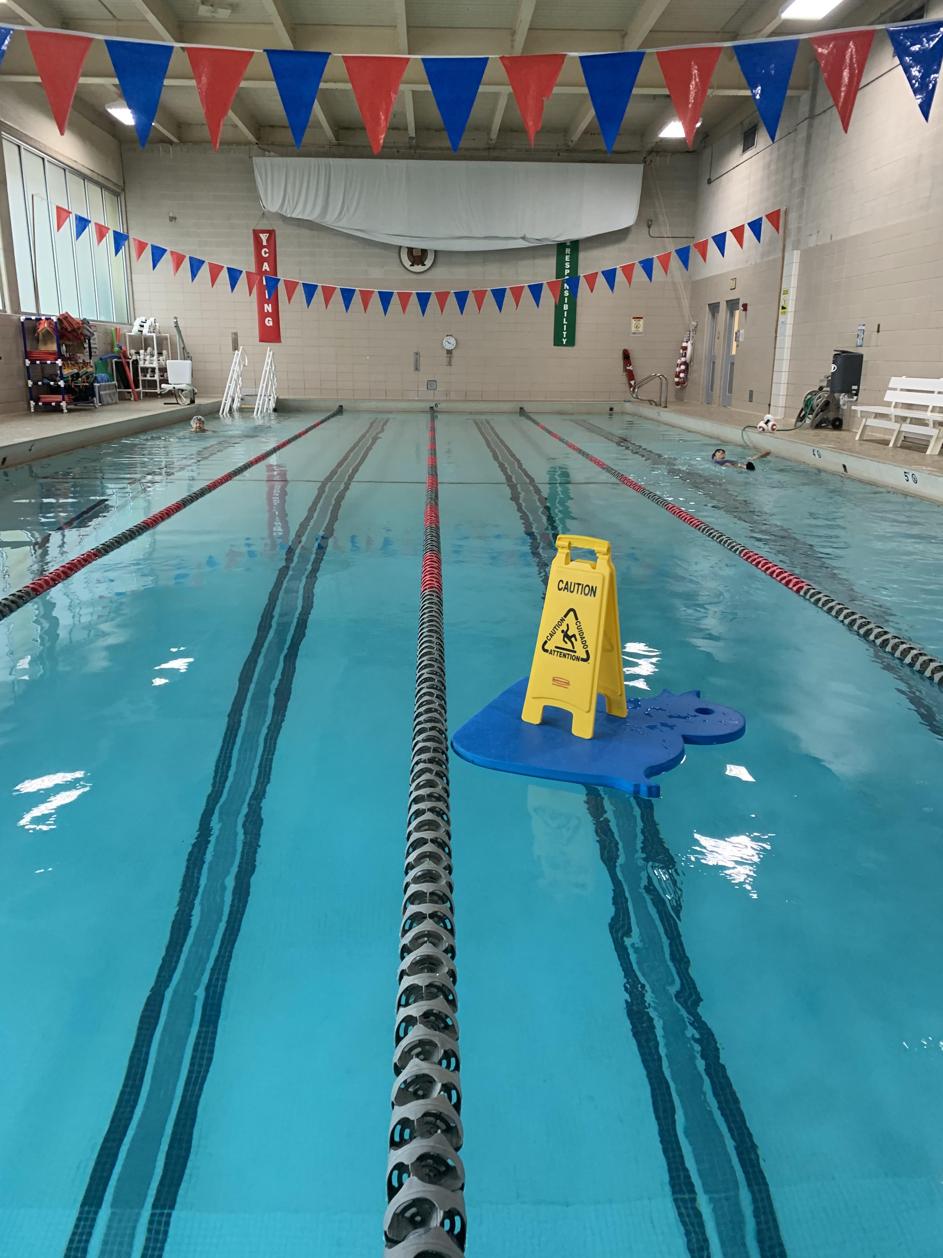 Put a “caution wet floor” sign atop of a giant floaty mat. Swimmers