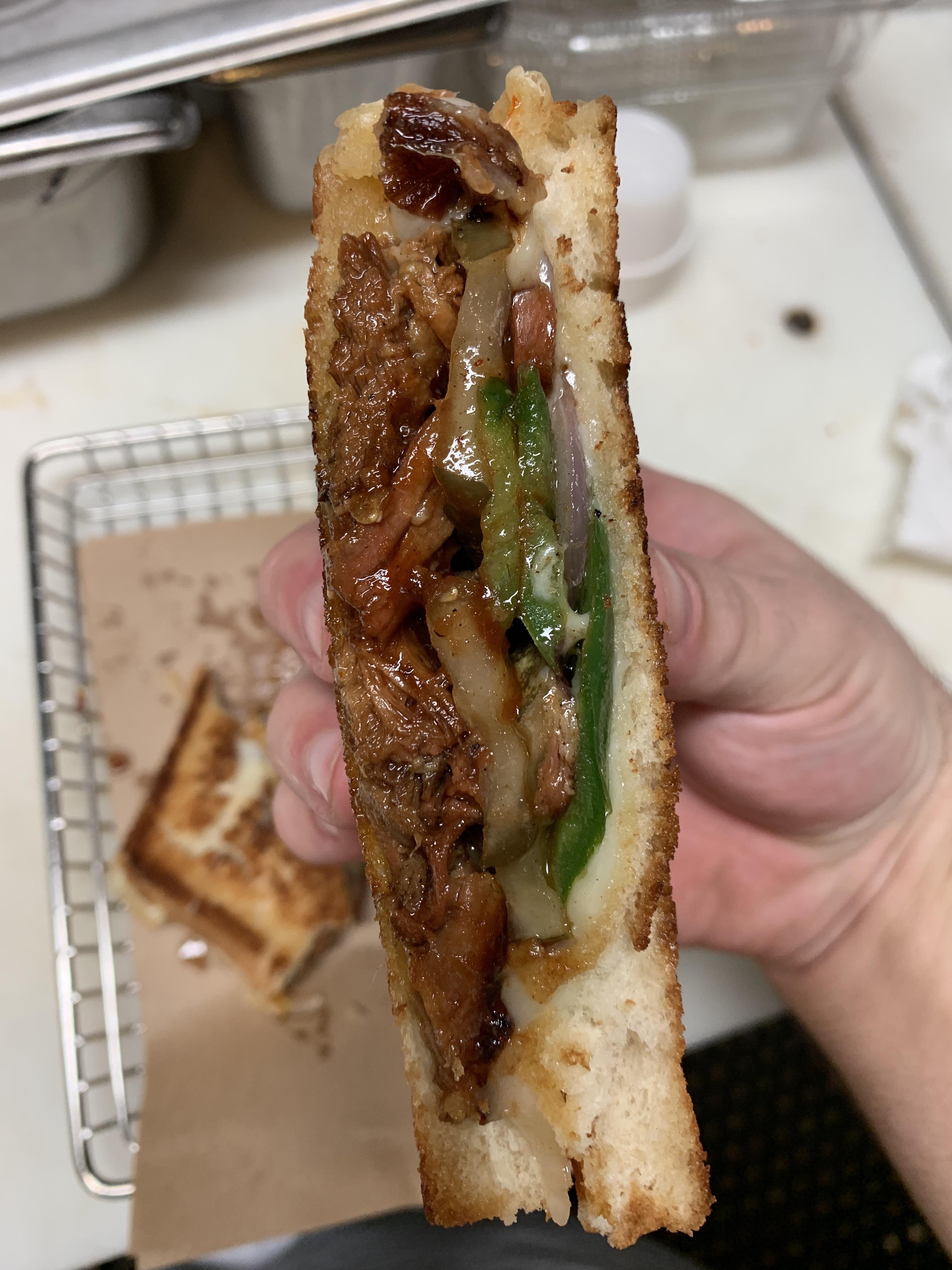 Brisket grilled cheese with Muenster cheese, bourbon bbq sauce, grilled