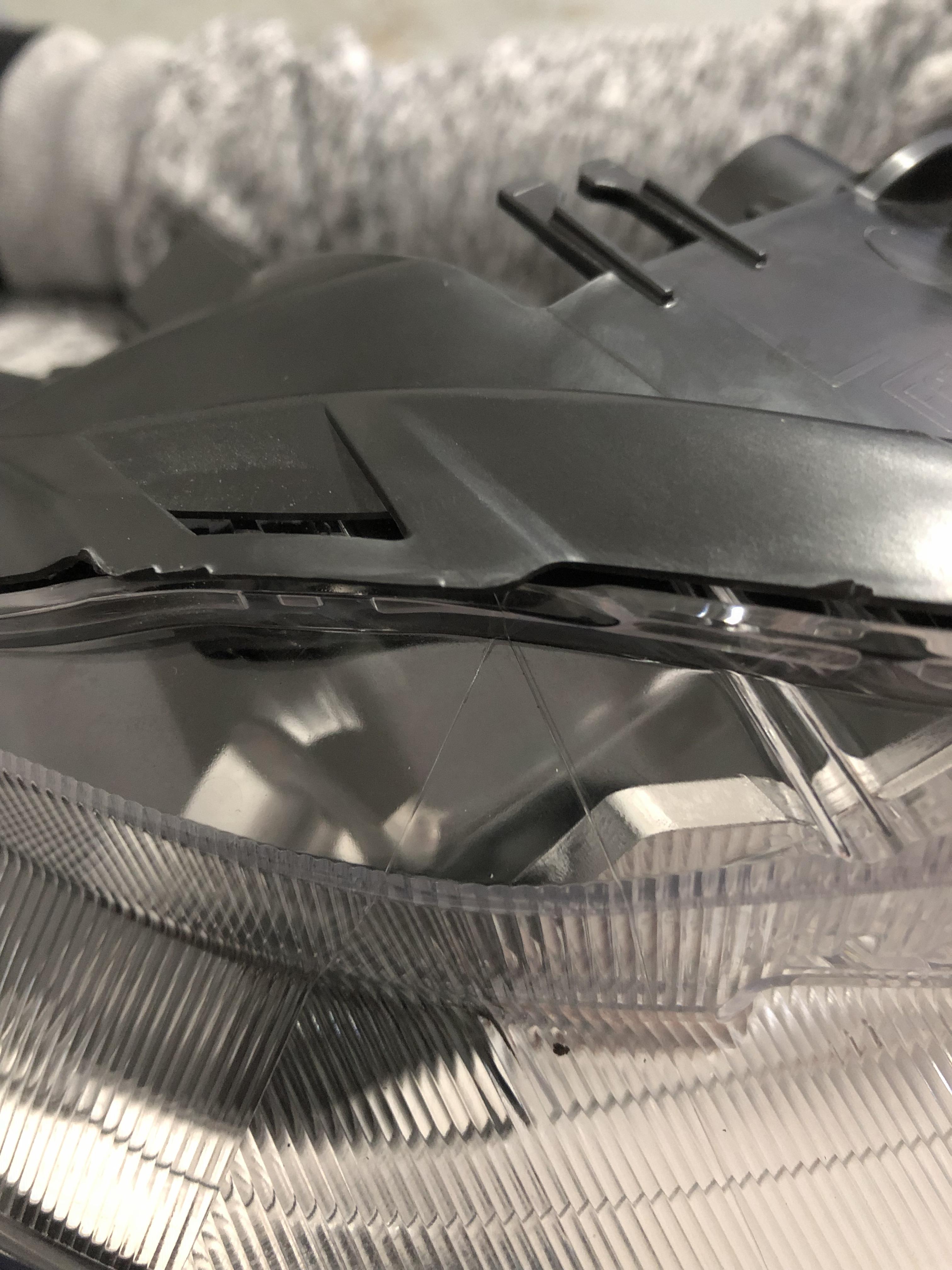 Cracked my headlight cover. Anyone know how to seal? r/WRX