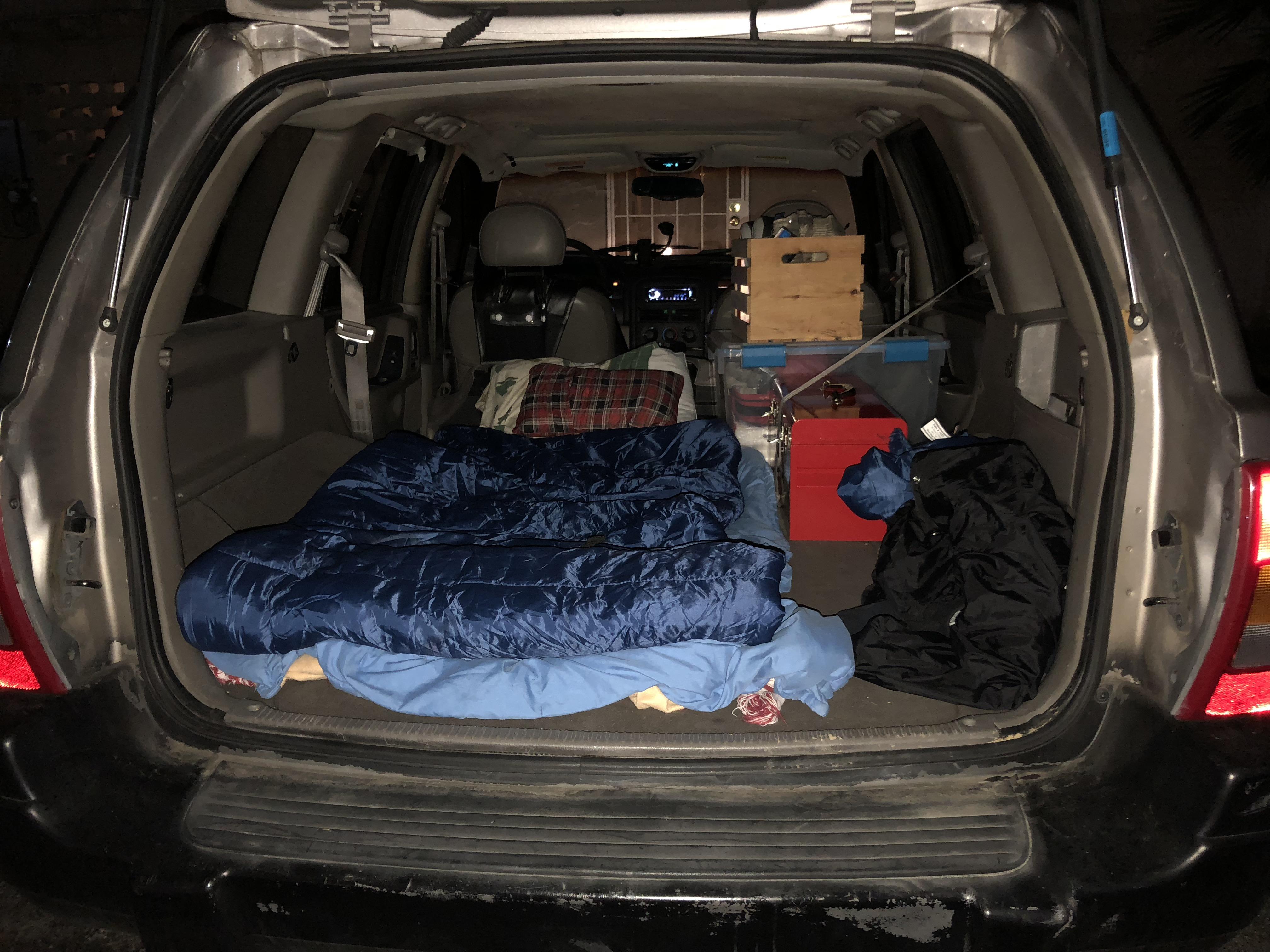Not an actual van dweller but had to sleep in my Jeep last night and it