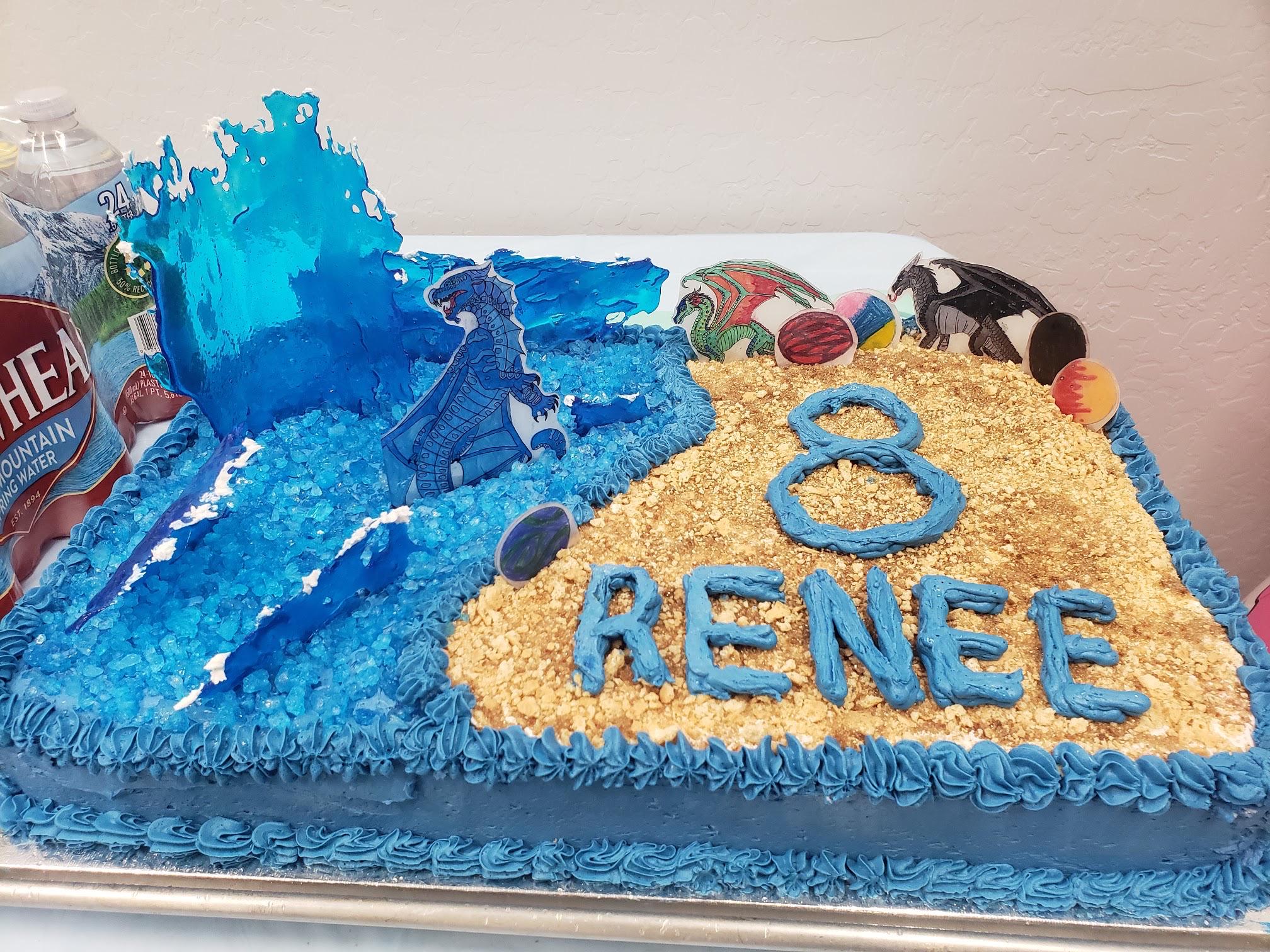 Made a Wings of Fire inspired cake for niece's birthday. She and her