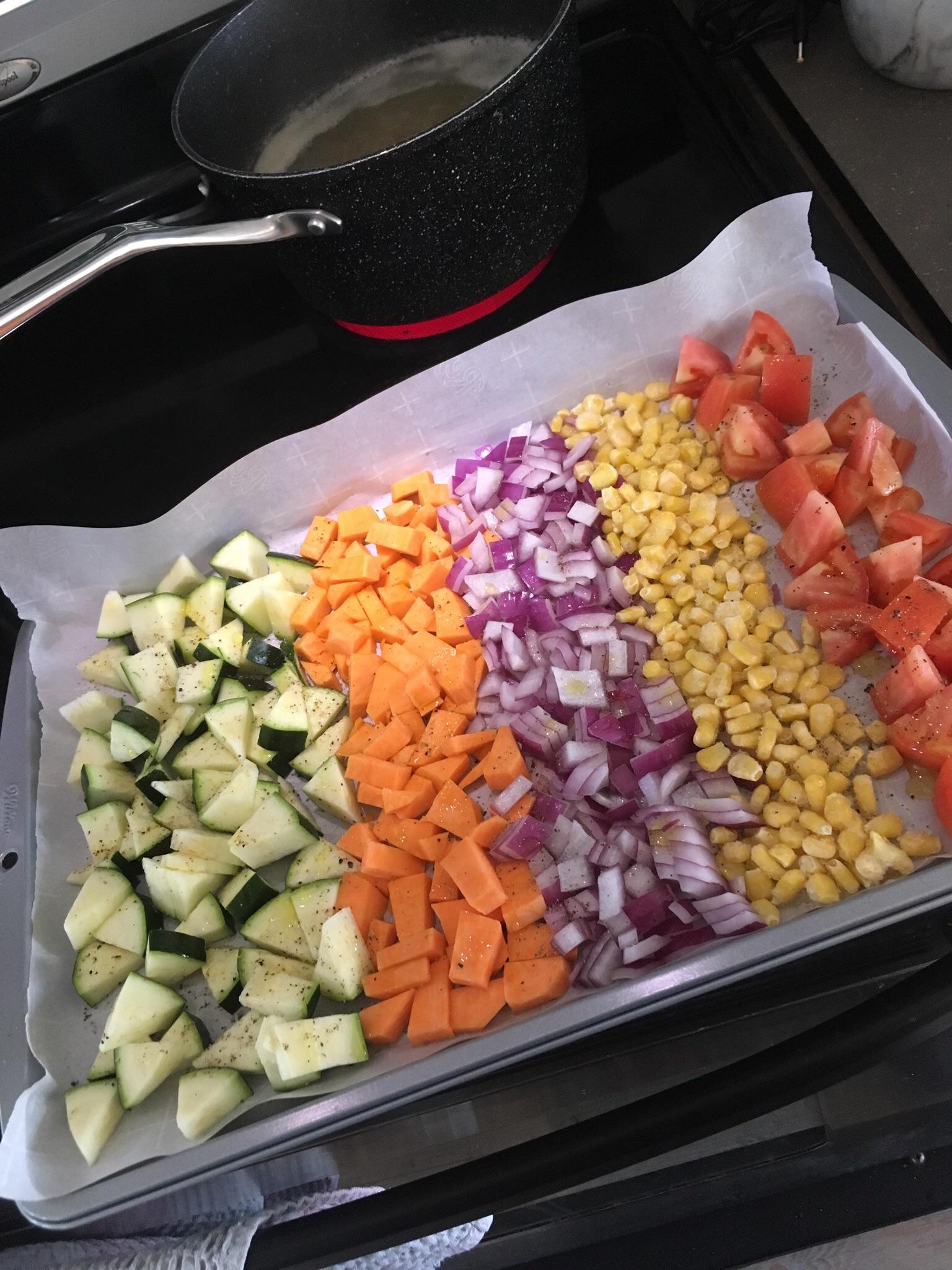 Roasted vegetable quinoa salad prep. Roast seasoned veggies in the oven
