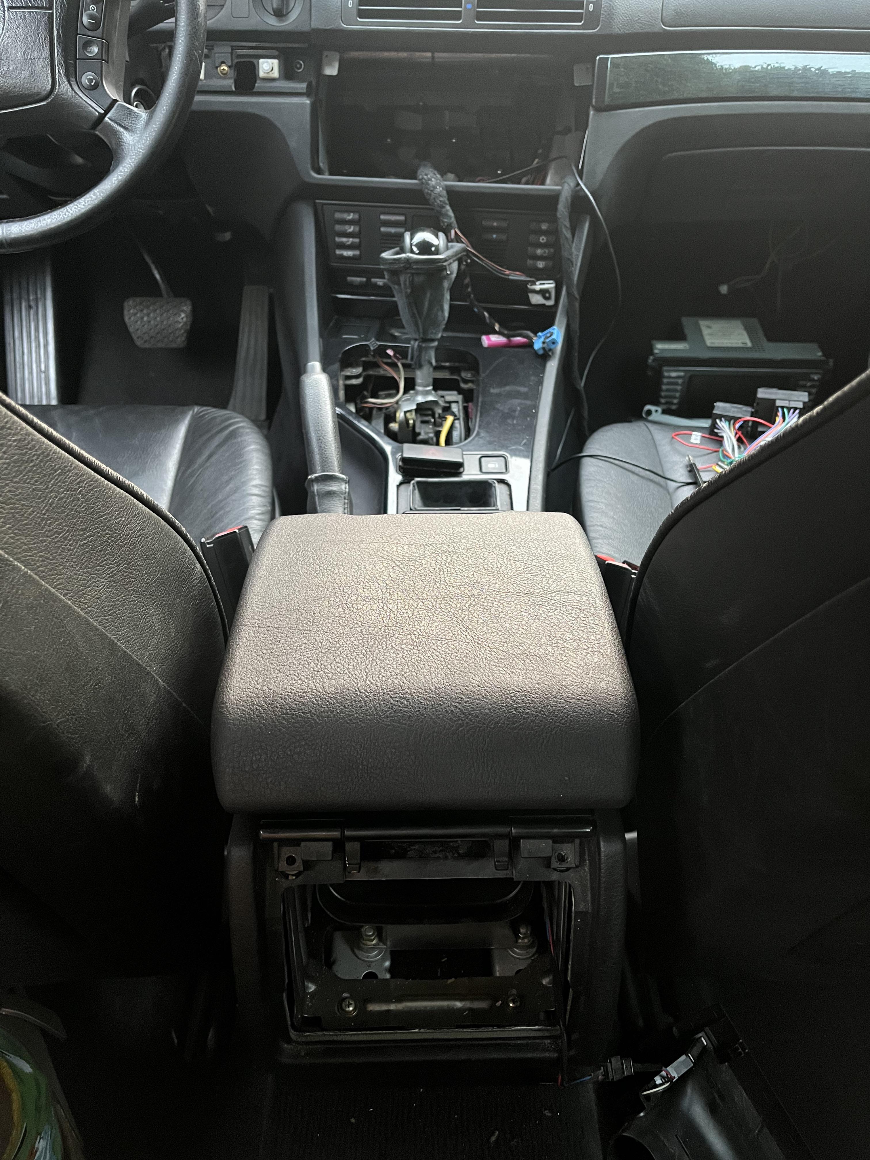 Bmw e39 need help removing central console arm rest , removed the