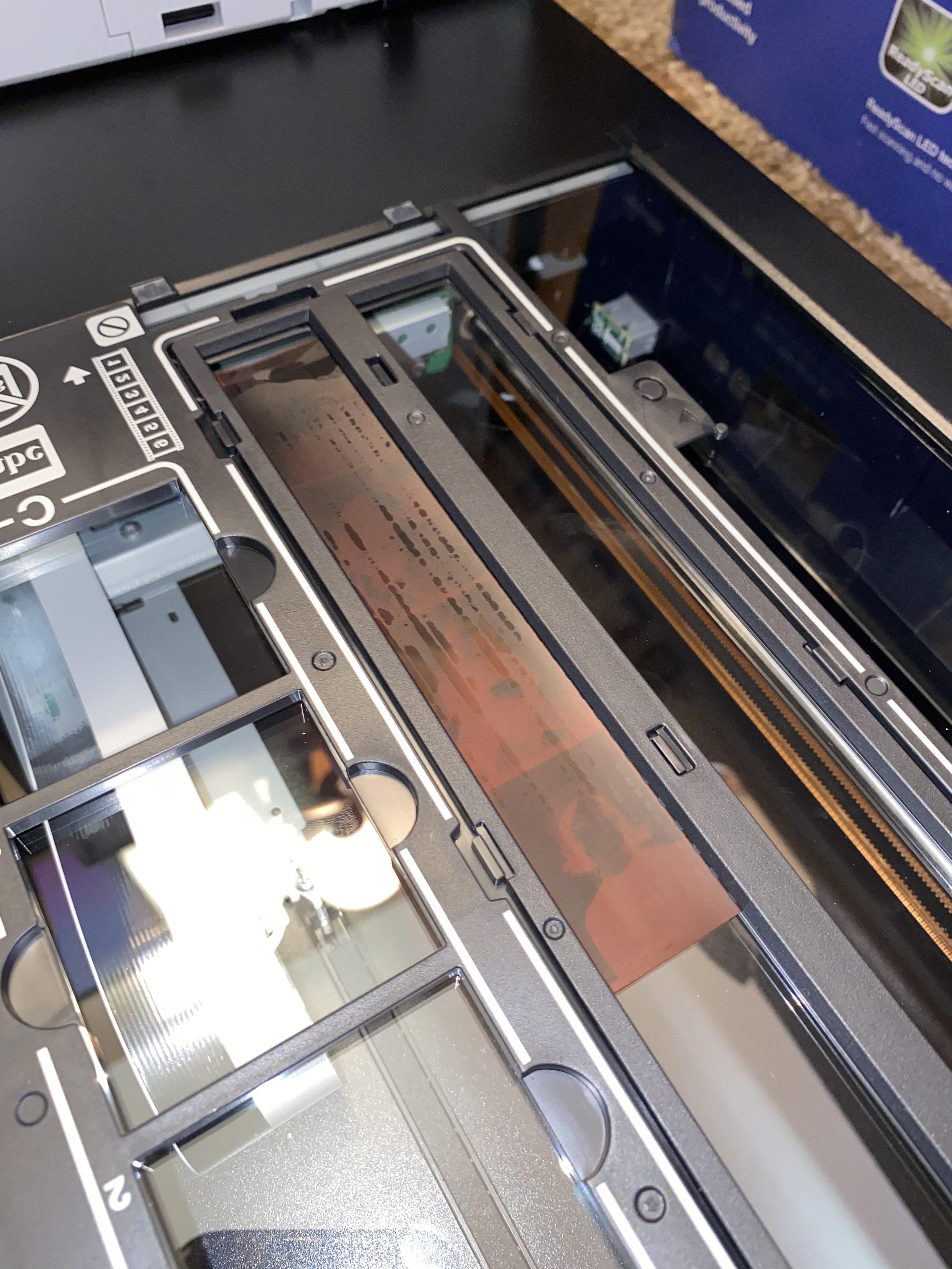 How do you clean smudged film negatives? I saw my negatives were dirty & smudged & I that