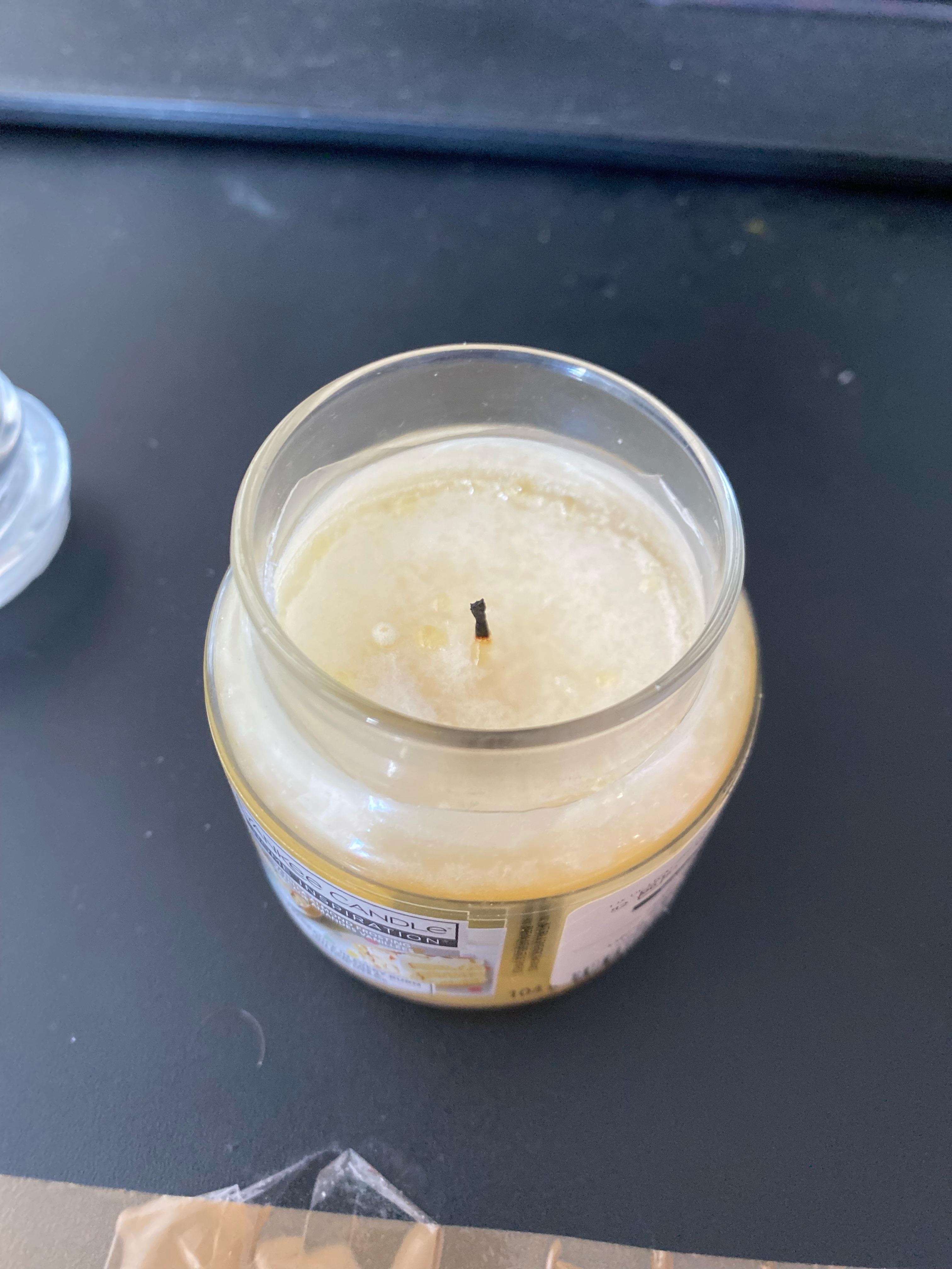 first time yankee candle, burned it a bit then blew it out. when i came back later the yellow