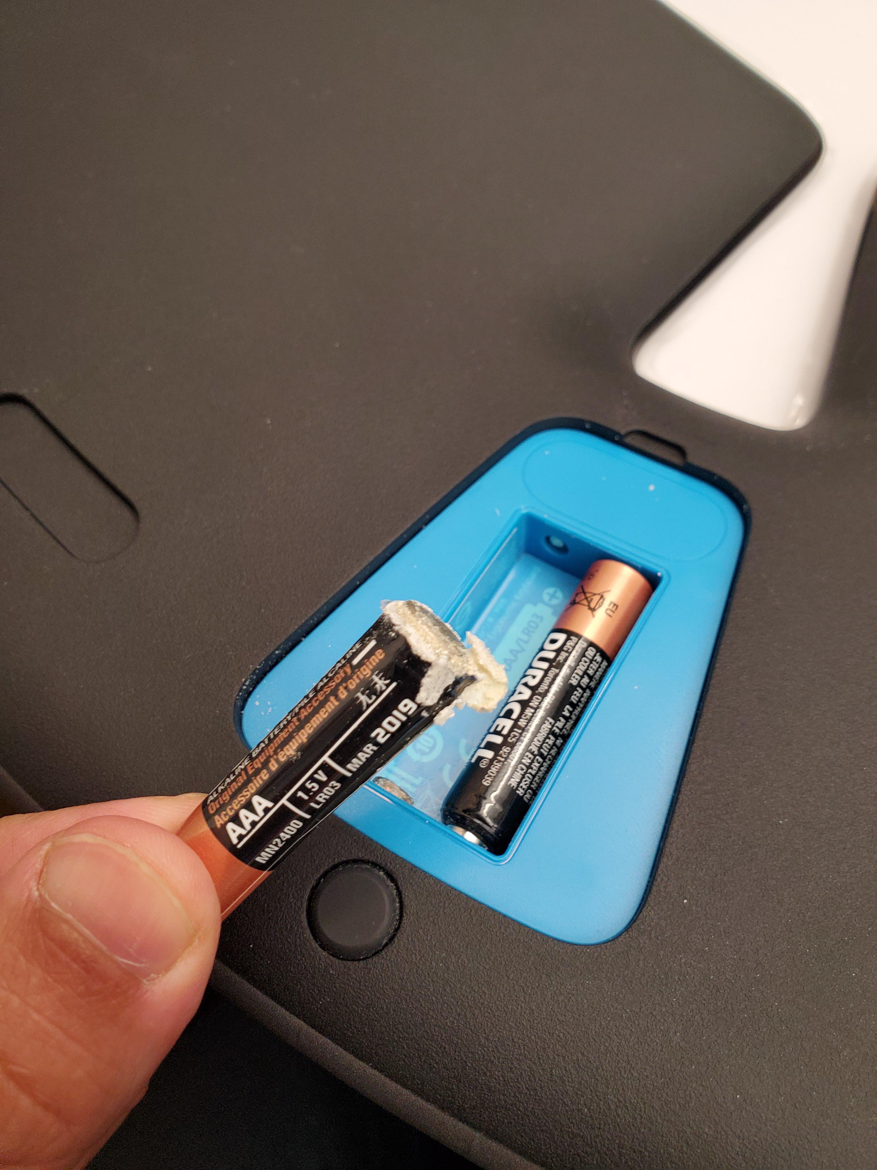 Battery leaked inside my keyboard. How can I properly clean it? (more
