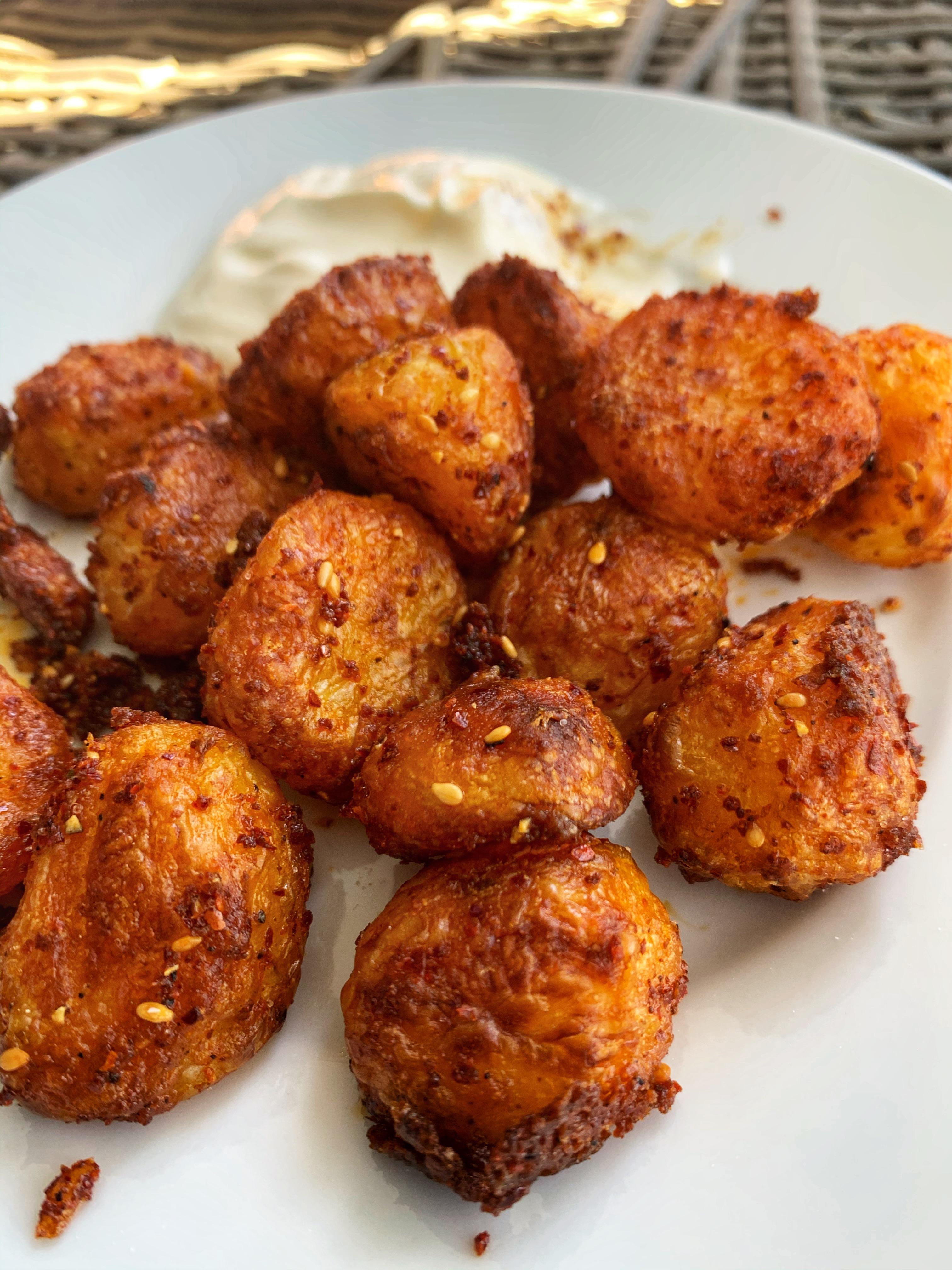 Kenji’s crispy roasted potatoes, but with gochugaru/sesame instead of