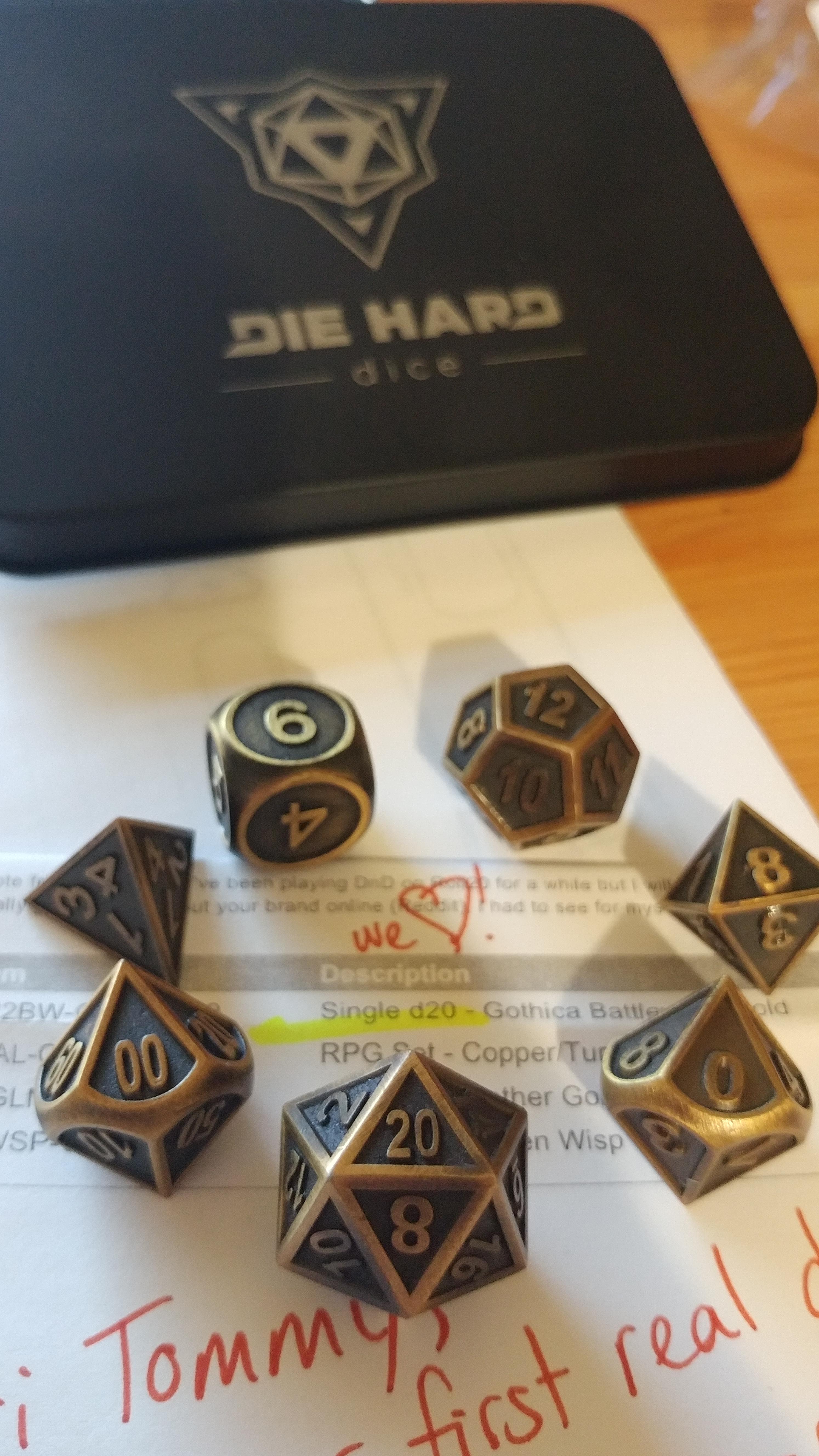 Ordered a single metalic D20 from Die Hard Dice. They sent me the whole