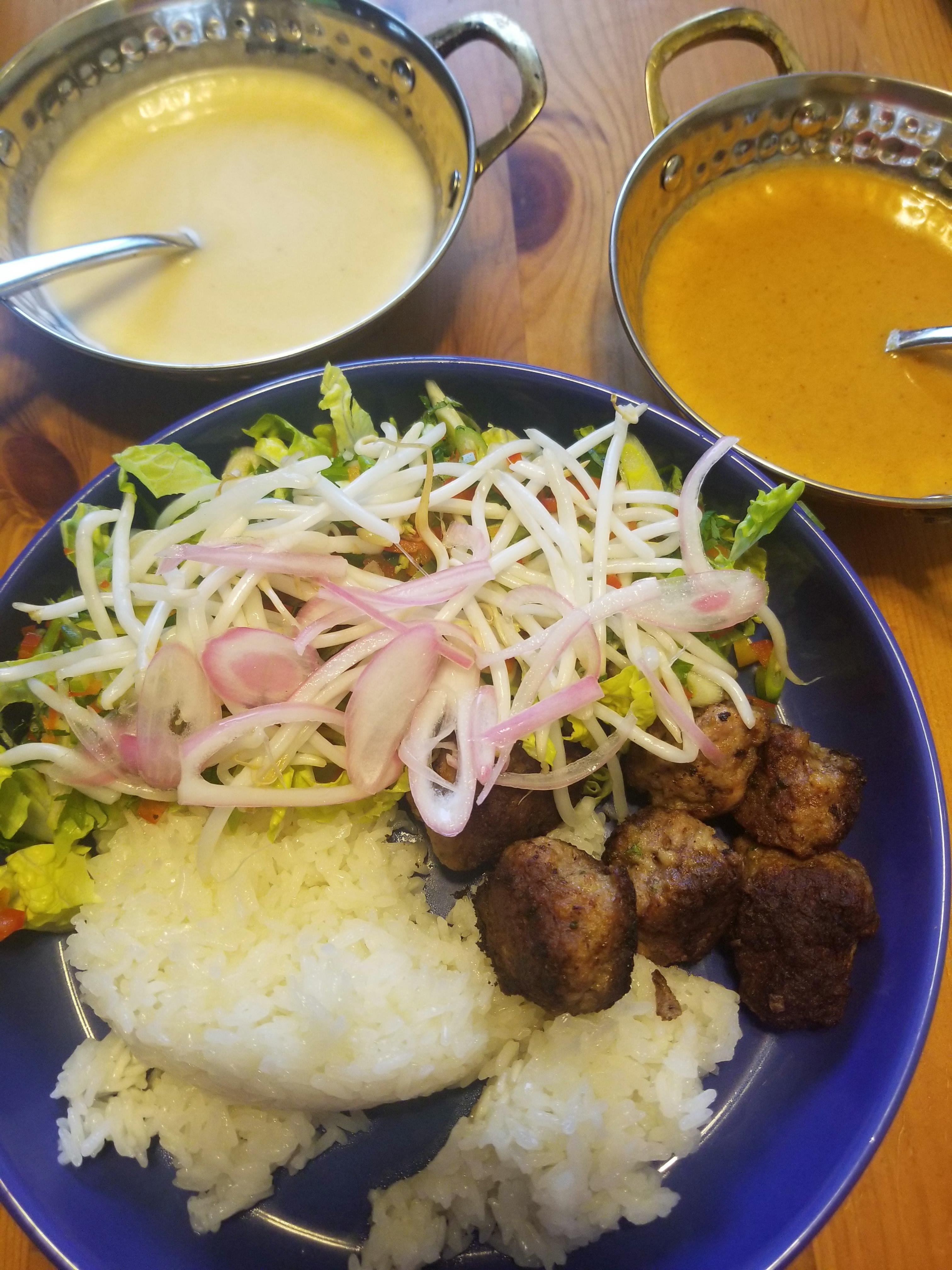 Thai meatballs, sticky rice, chopped salad with pickled shallots, lime