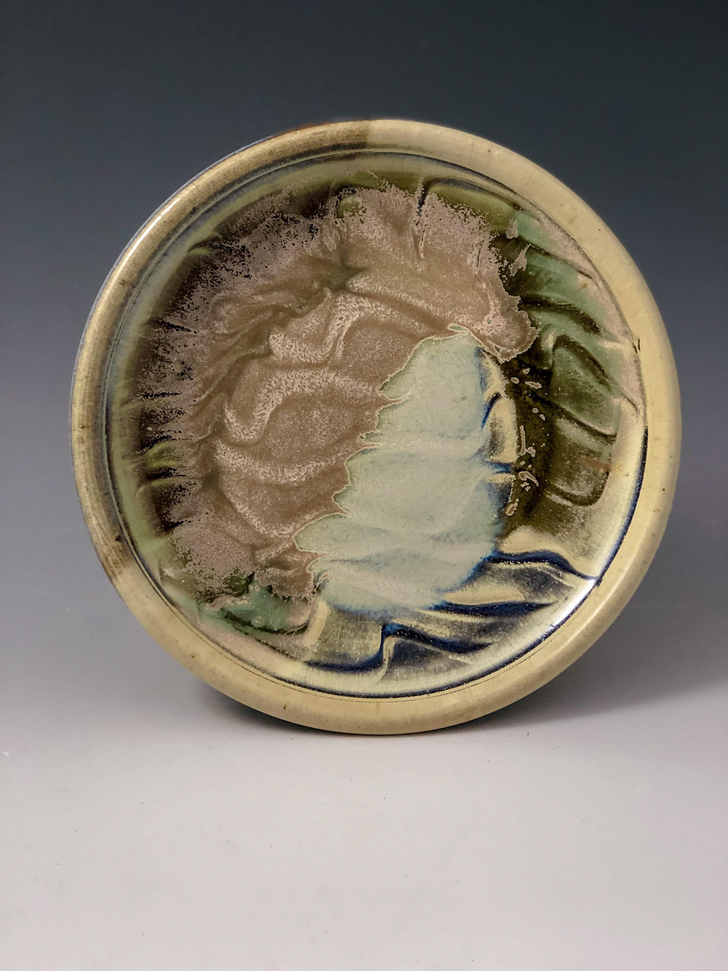 Stellar plate fresh from the kiln. 8 inch diameter, white stoneware