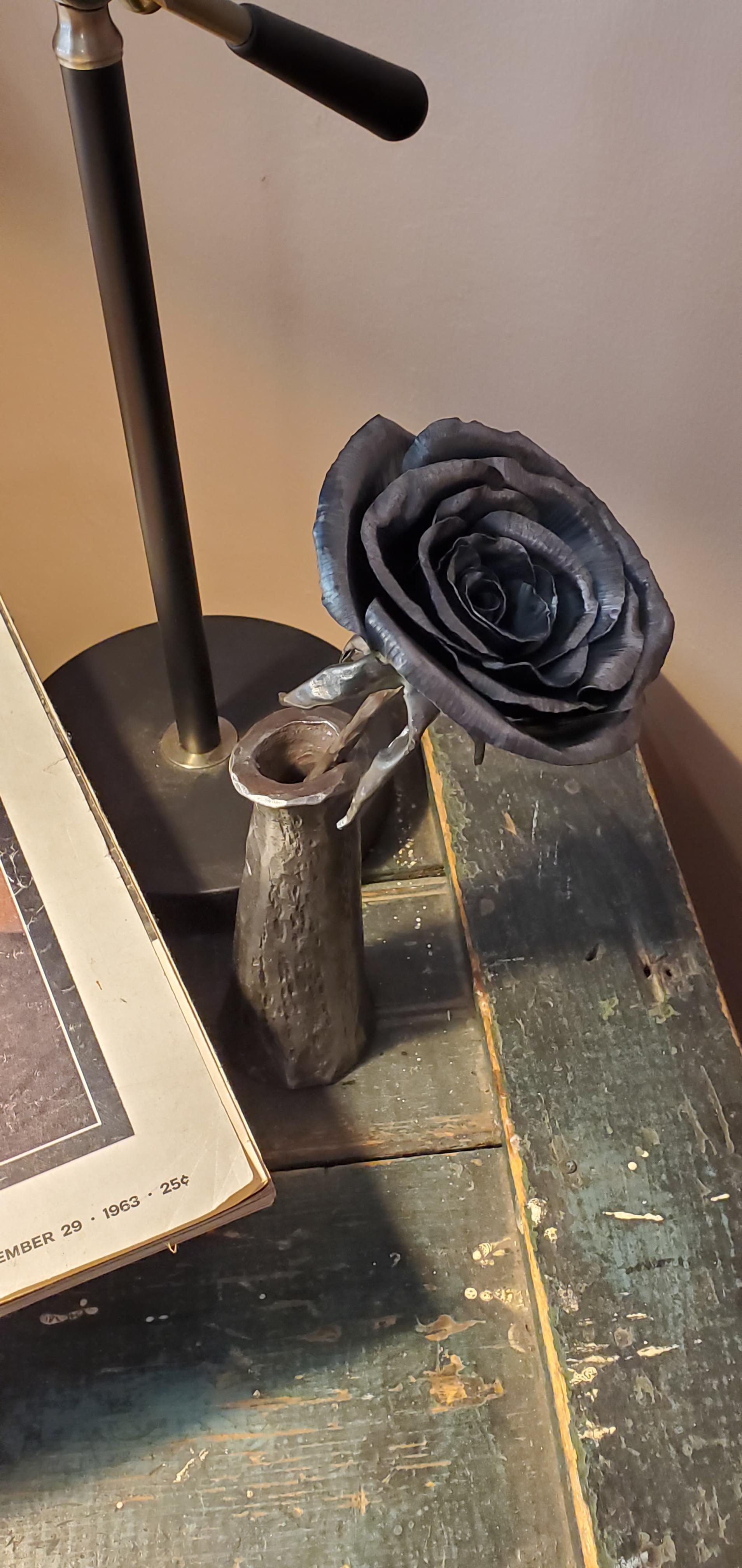22ga sheet metal rose with vase made from 1/4" steel plate. r