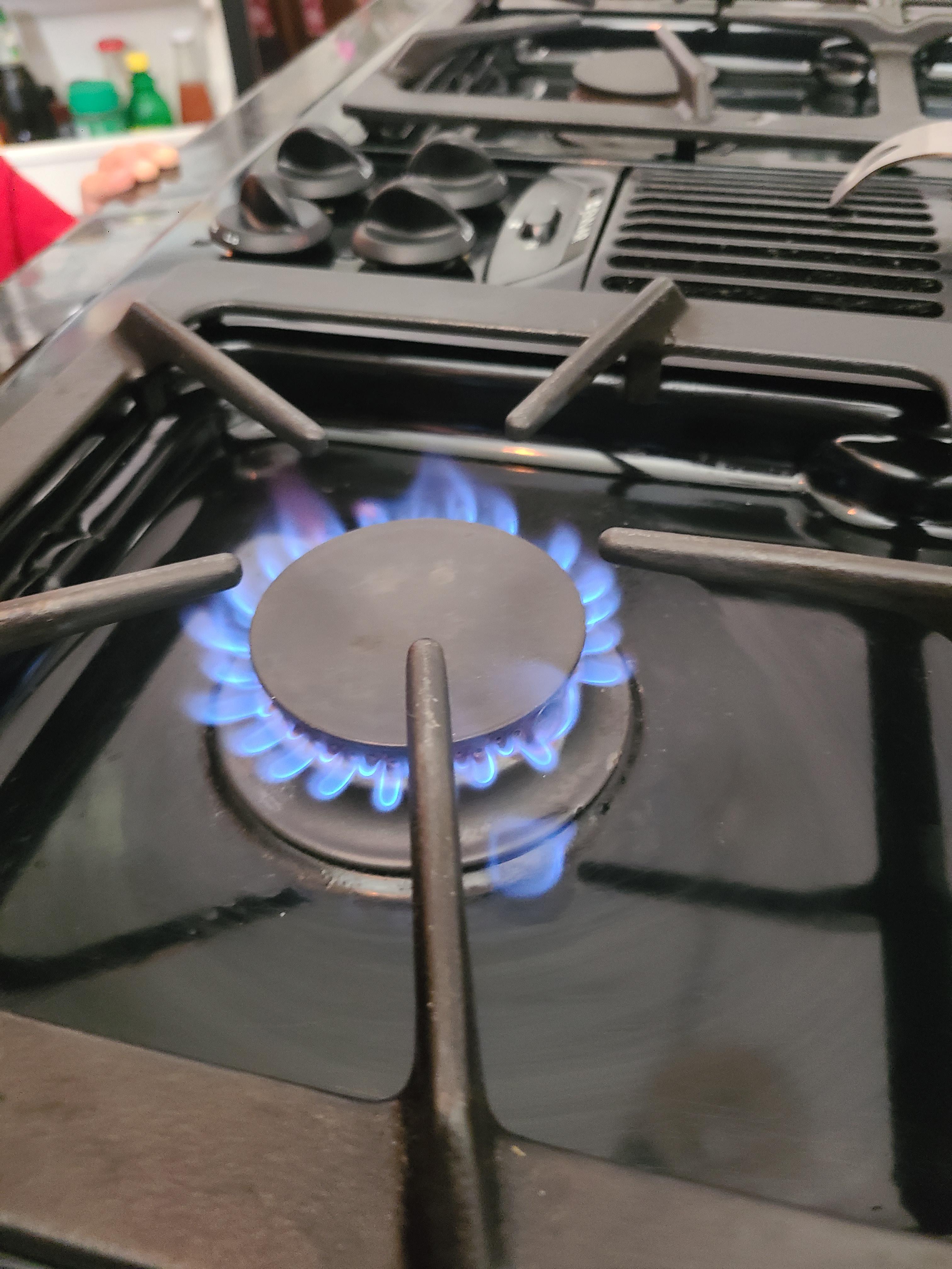 Gas coming from seal under stove eye, is this dangerous and can I fix