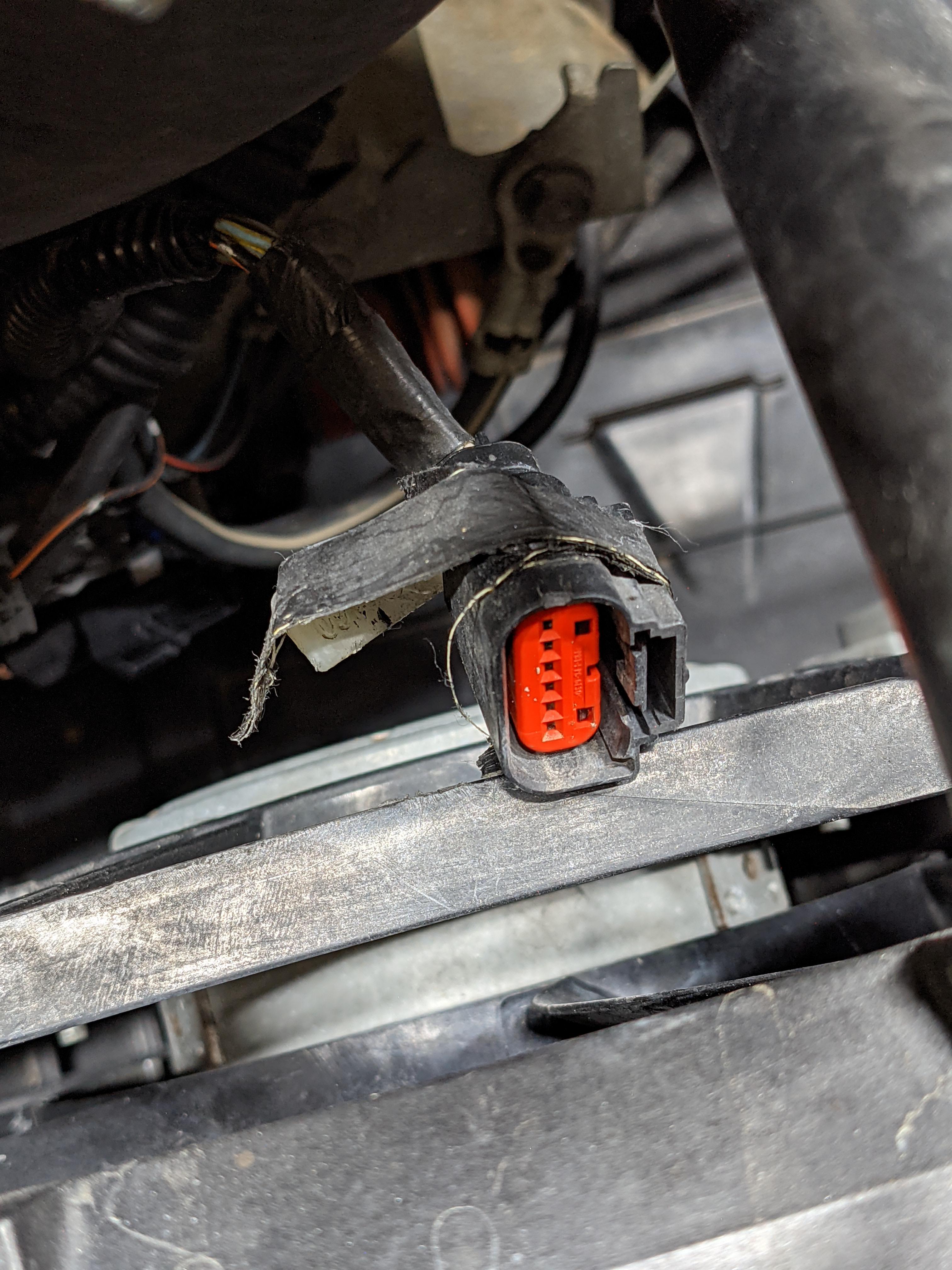 Is the throttle body connector supposed to have tape around it?? Been