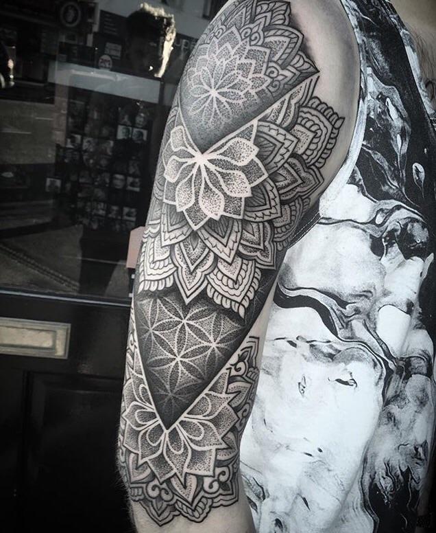 Geometric half sleeve I got off Chris Bintt at Silver Needles in South
