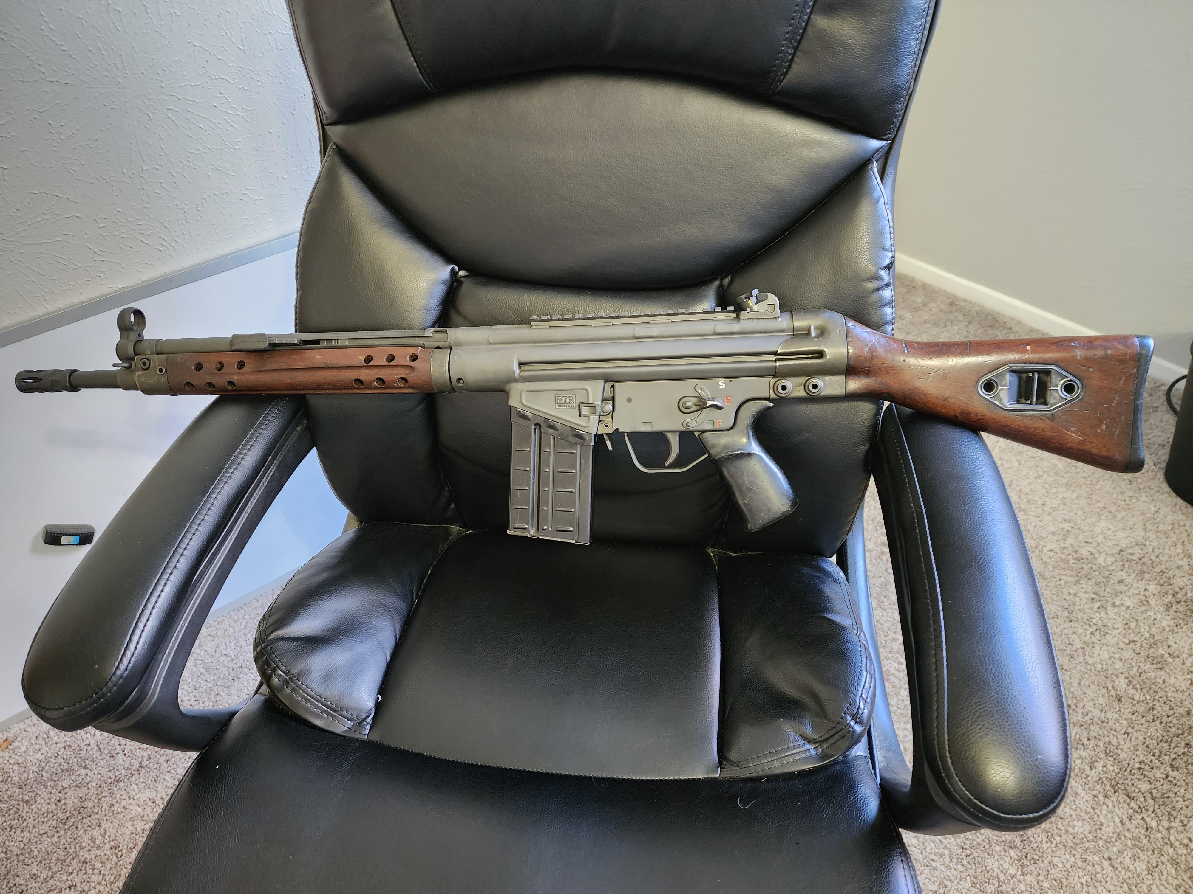 I just joined the PTR family! Brand new rifle, old school furniture