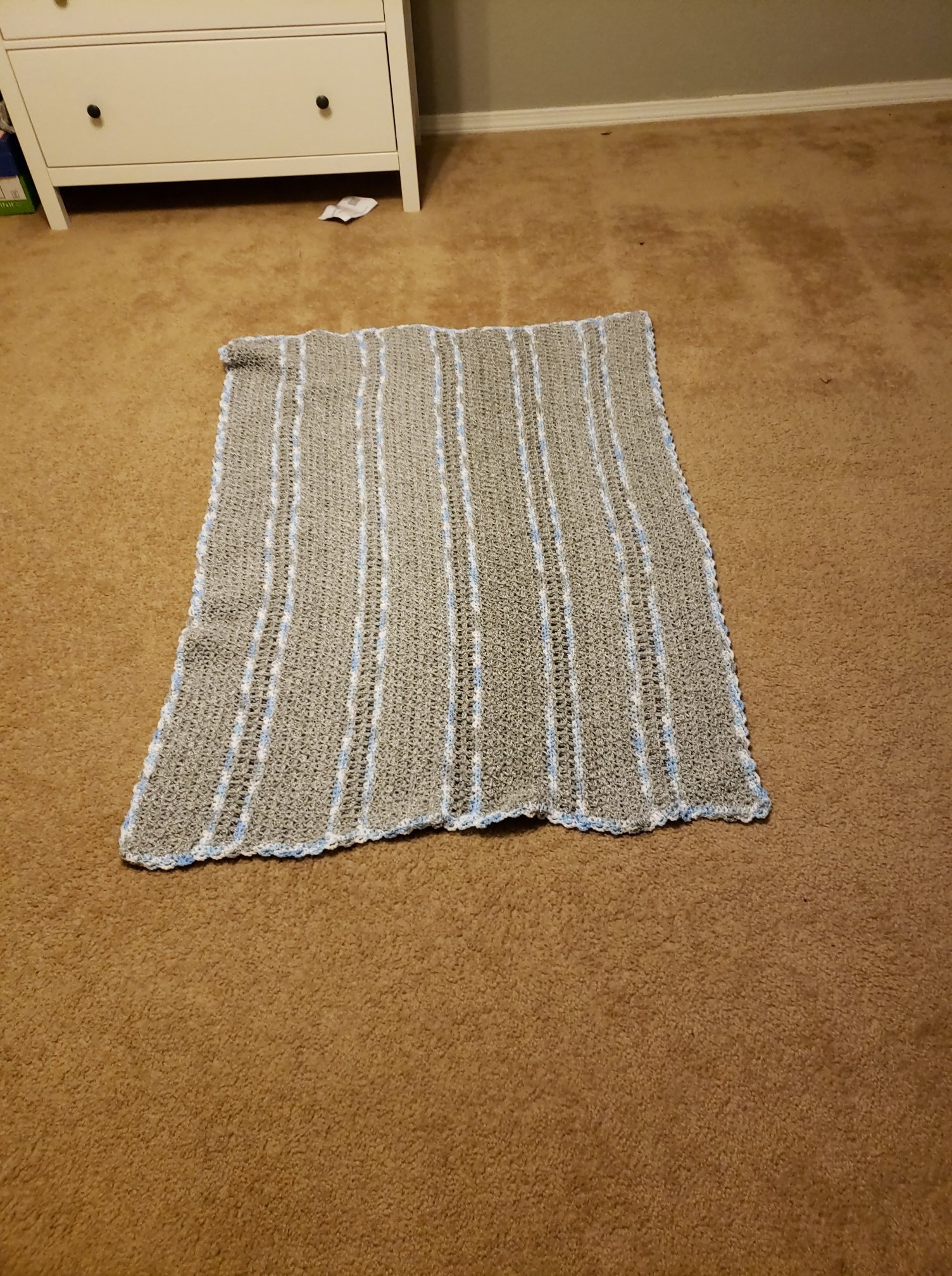 Baby blanket for my first! Made with lightweight yarn and snowflakes