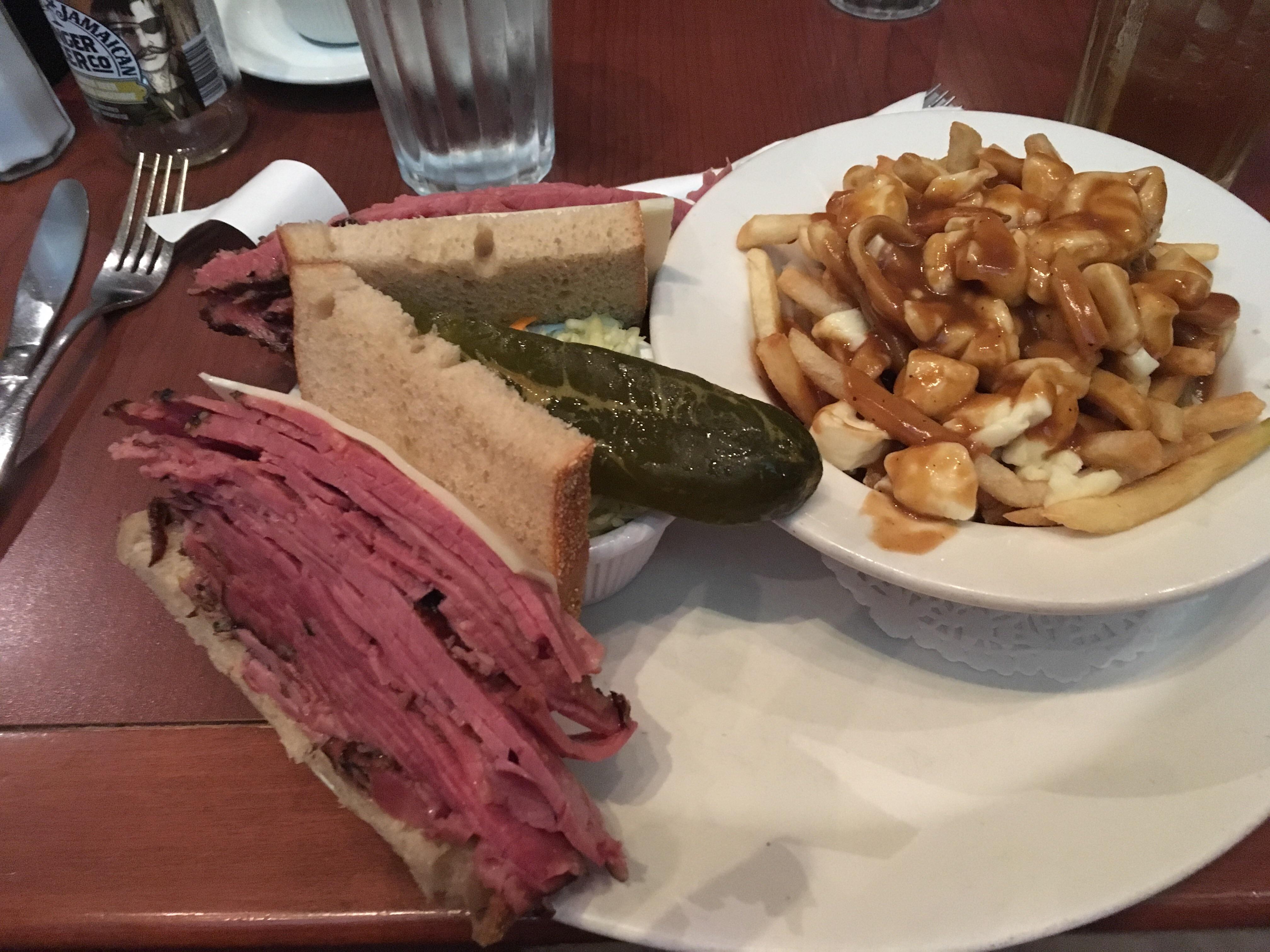 [I ate] Montreal smoked meat sandwich and poutine. r/food