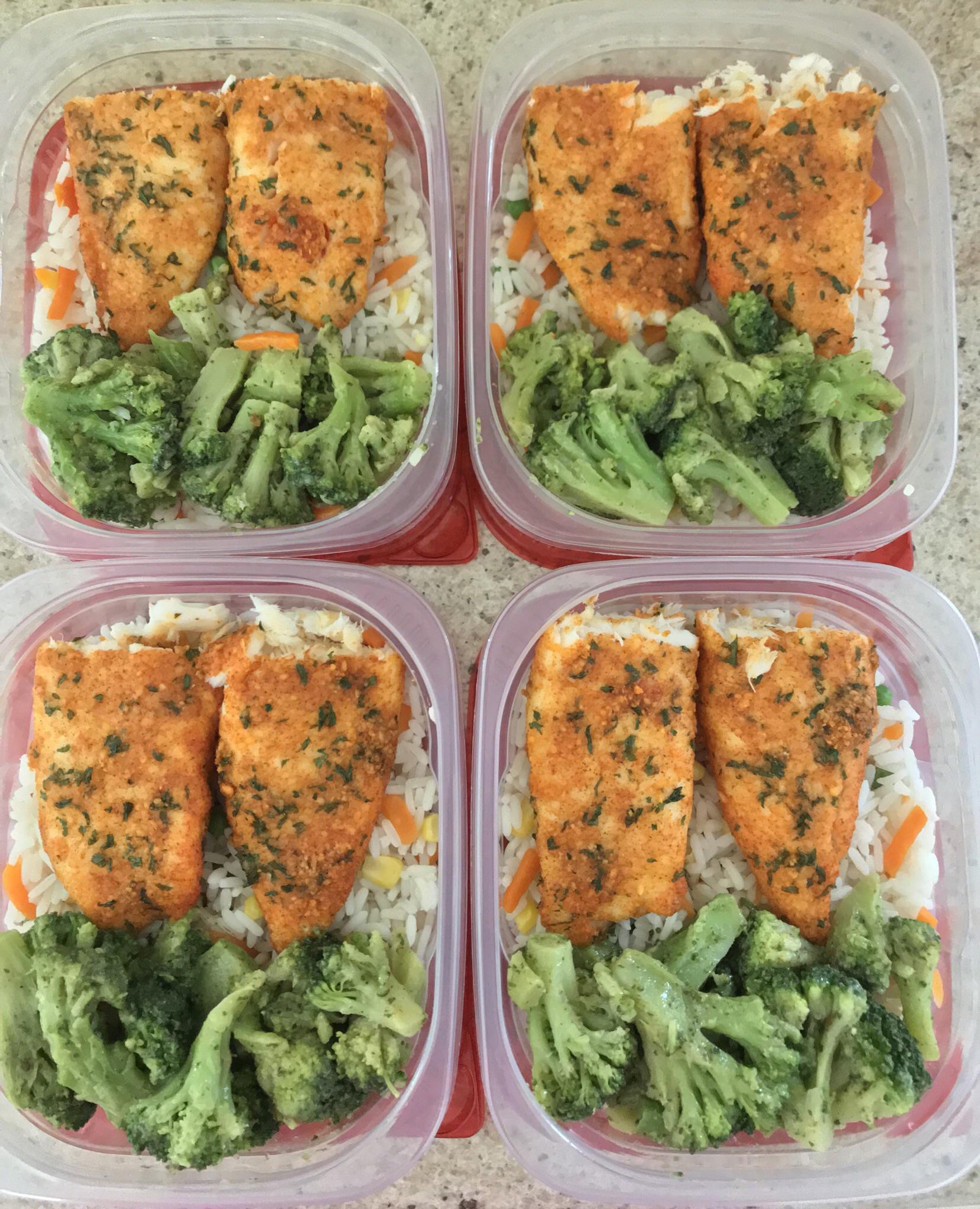 First Prep Parmesan crusted tilapia with seasoned broccoli on a bed of rice and mixed