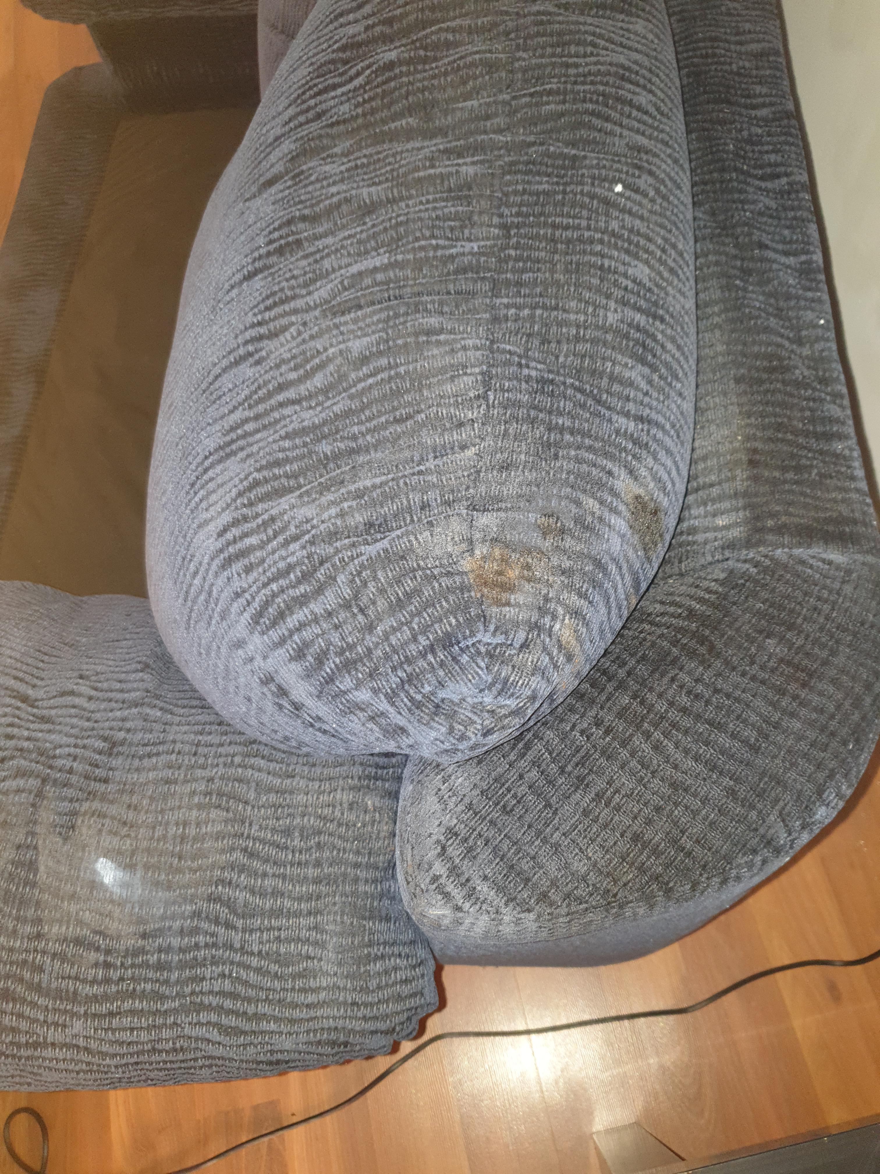 how to clean this stain off my couch? idk what it is but its thick and