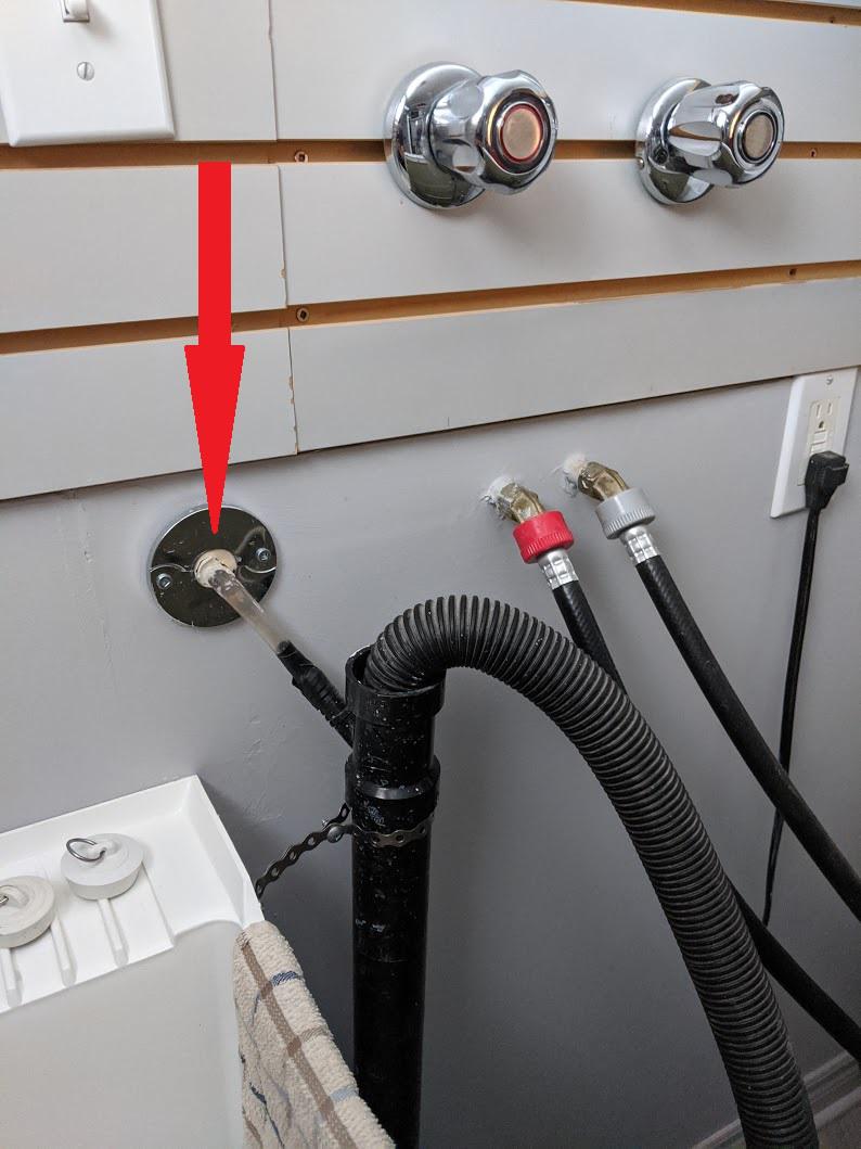 [Help] Small clear tube coming out of wall, into laundry drain what