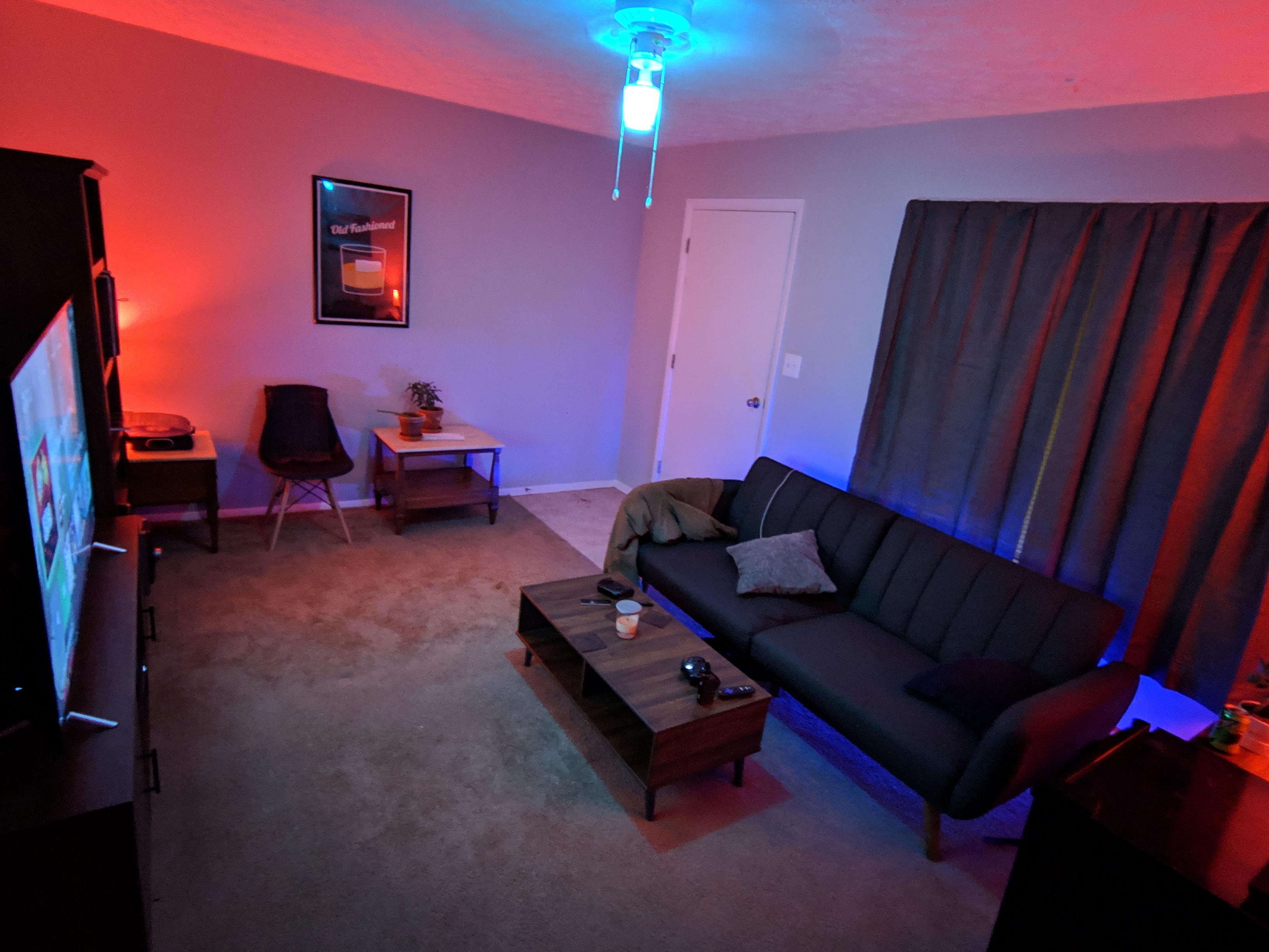 First apartment. This is my living room. A modern take on Mid Century featuring Philips Hue and